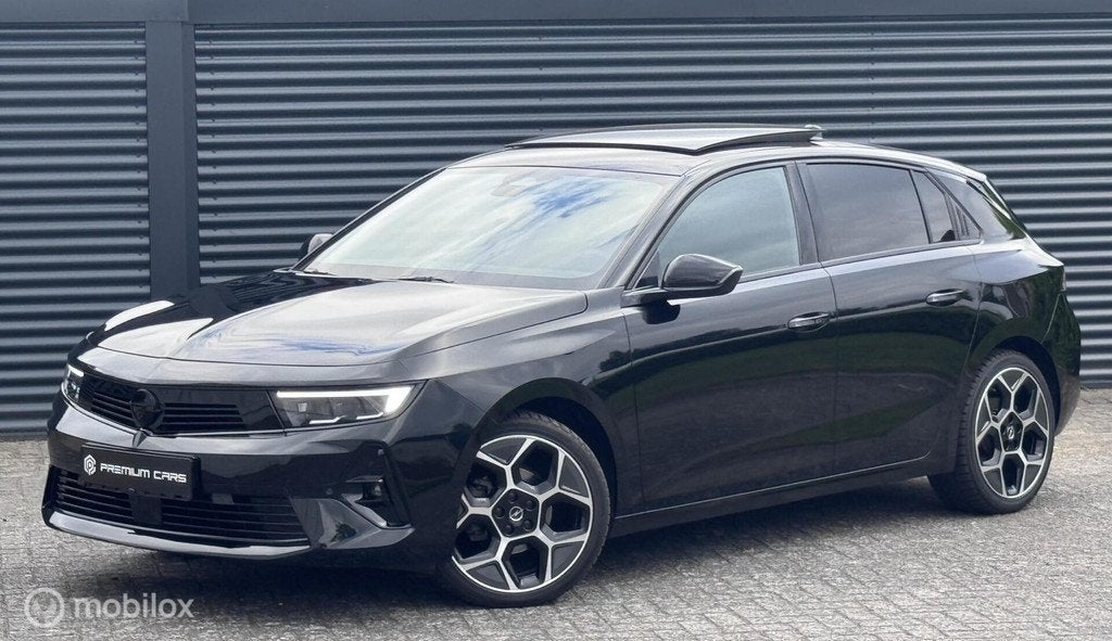 Opel Astra 1.2 Turbo Ultimate Pano HUD Memory 360°ACC,, Auto's, Opel, Gebruikt, Zwart, 1199 cc, Zwart