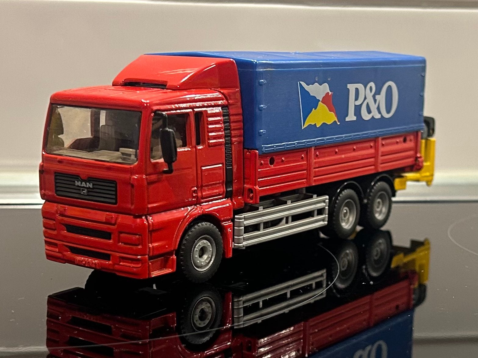 Siku MAN TGX P&O 1:55, Verzenden, Zo goed als nieuw, Bus of Vrachtwagen