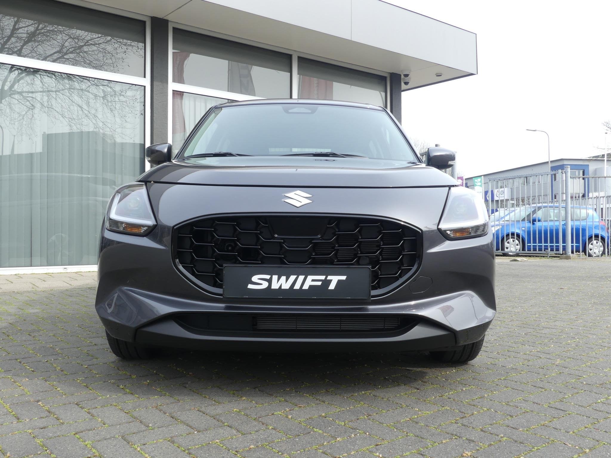 Suzuki Swift 1.2 Style Smart Hybrid NIEUW uit voorraad lever, Auto's, Suzuki, Voorwielaandrijving, 12 maanden, Stof, Bedrijf