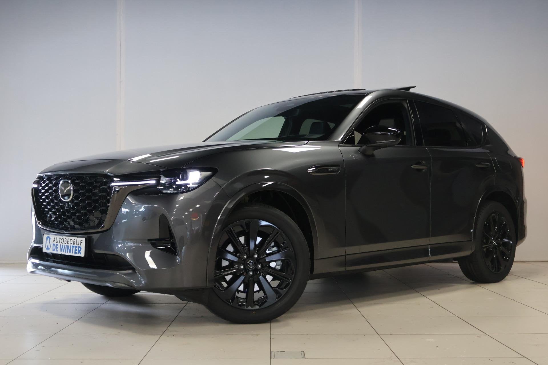 Mazda CX-60 2.5 e-SkyActiv PHEV Homura Plus ., Auto's, Mazda, Automaat, Gebruikt, Zwart, 2500 kg