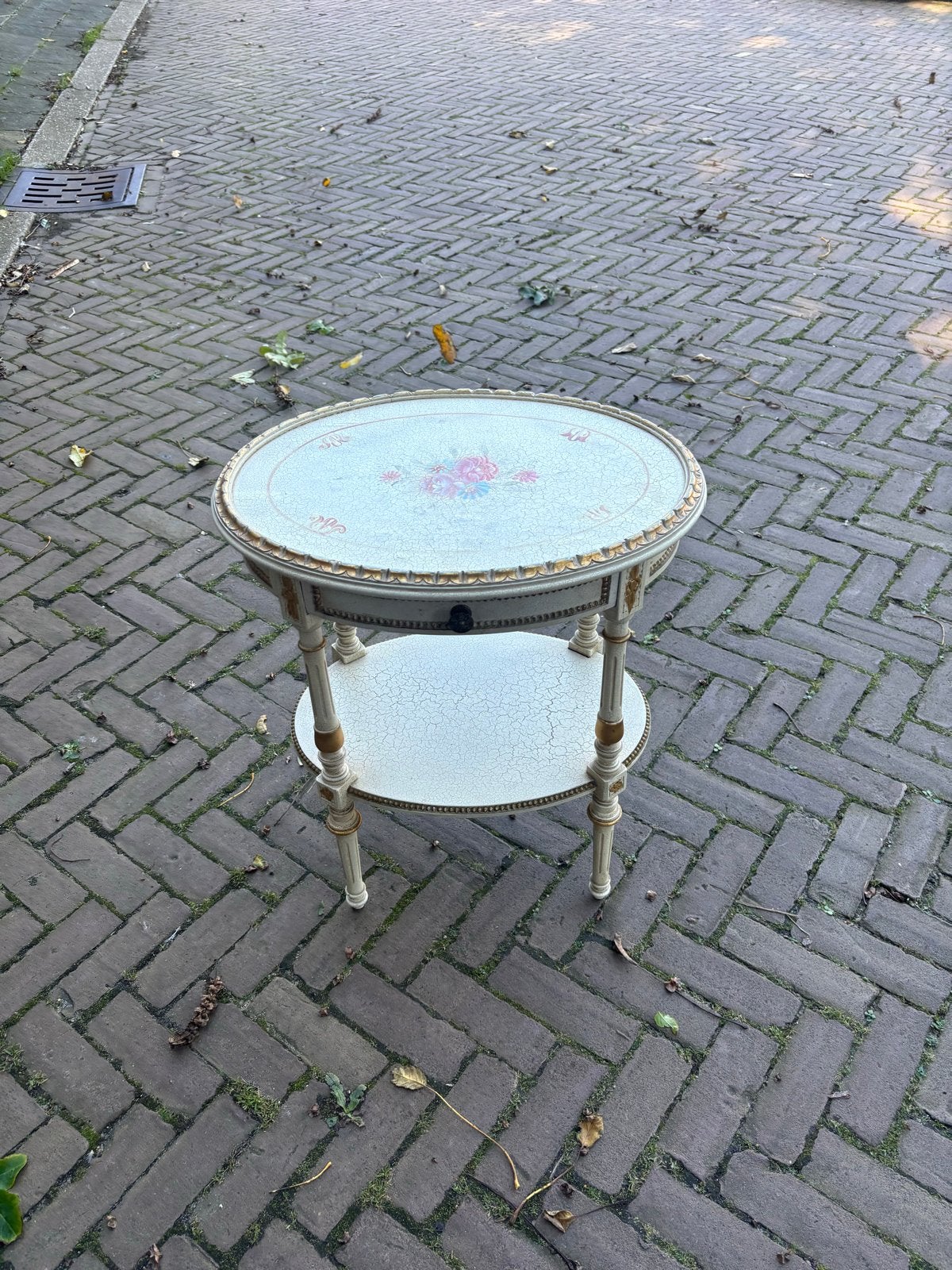Vintage bijzettafel met bloemmotief en lade, Ophalen of Verzenden