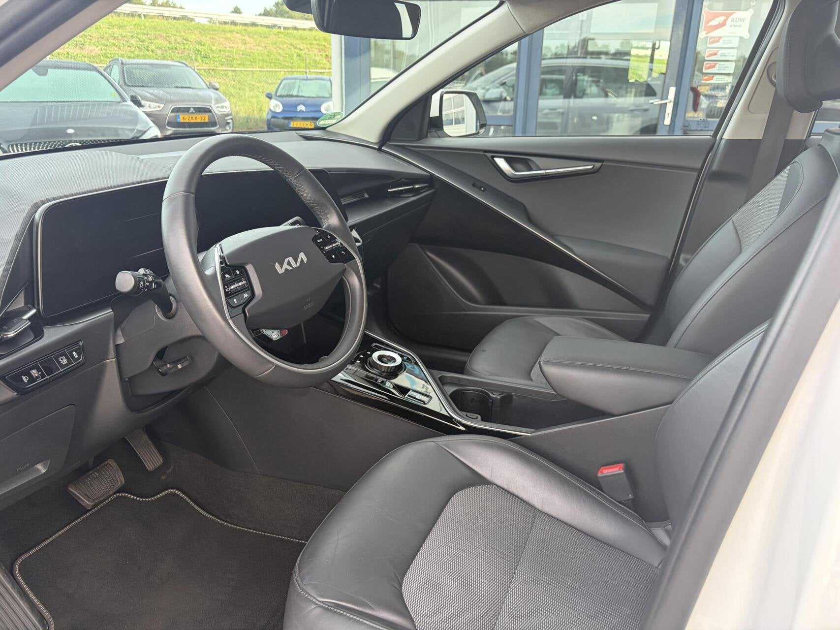 Kia Niro 1.6 GDi Hybrid DynamicLine, Auto's, 1374 kg, Gebruikt, Met garantie (alle), Leder en Stof