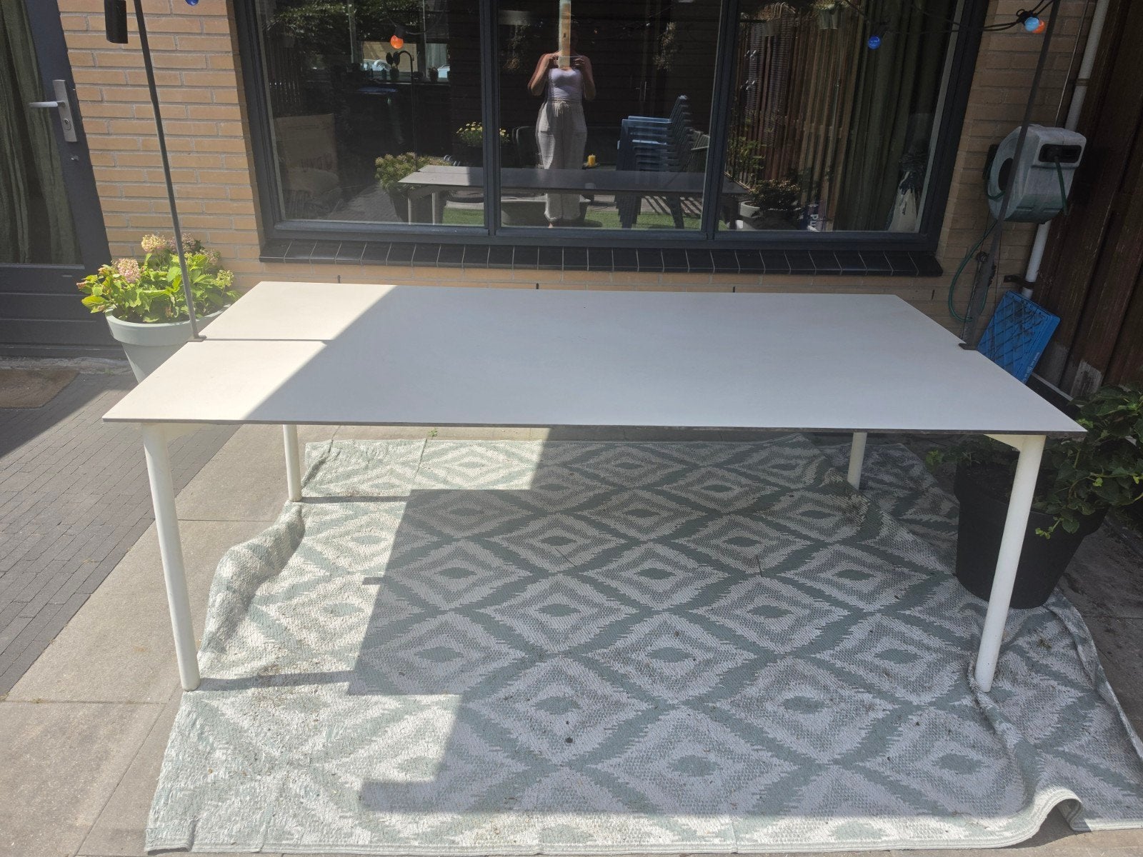 Tuinset met Trespa tafelblad en 7 lichtblauwe stoelen, Ophalen