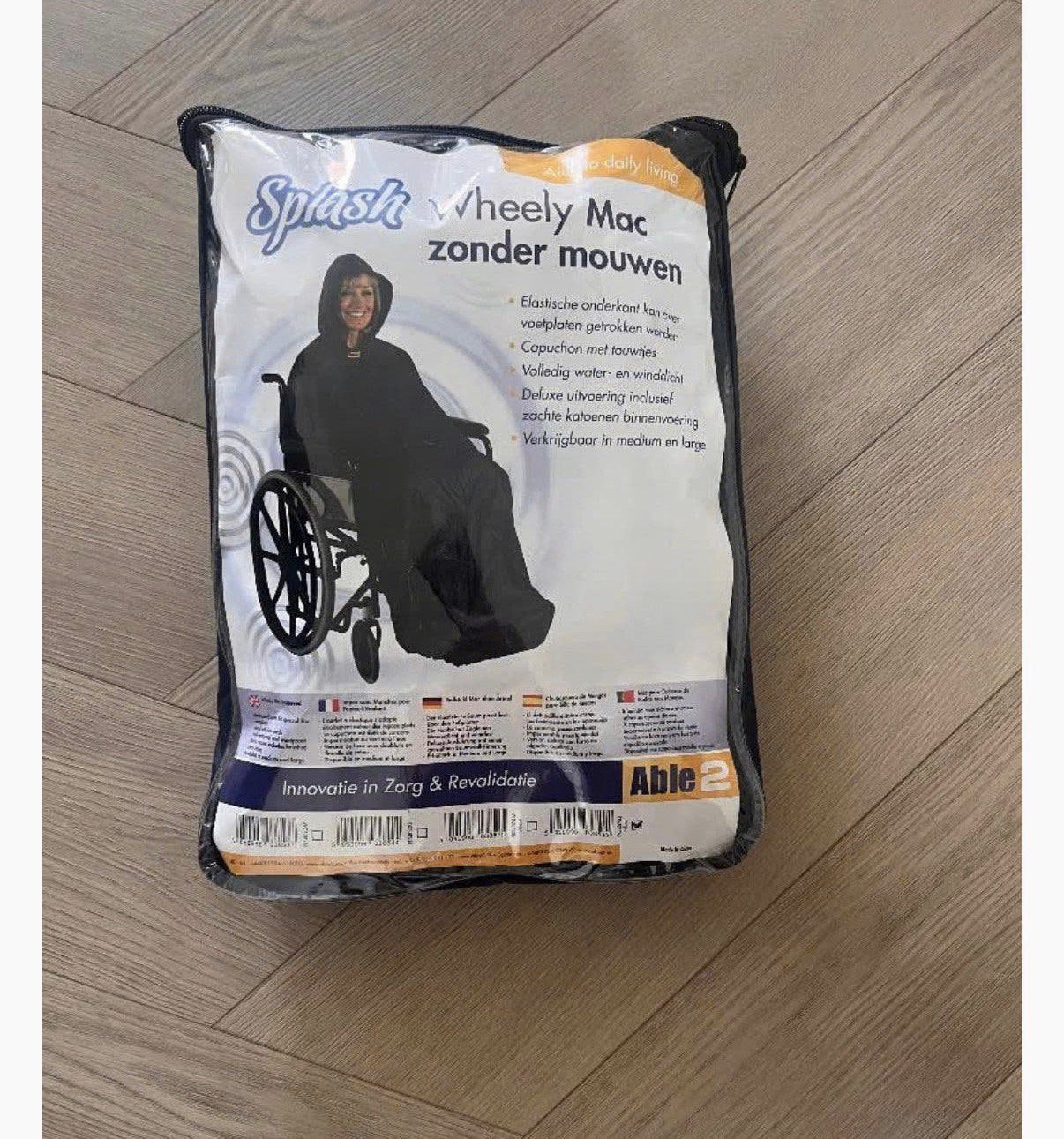Rolstoelhoes zonder mouwen en geheel omsluitend (dames/heren, Ophalen of Verzenden, Zo goed als nieuw, Regenjas
