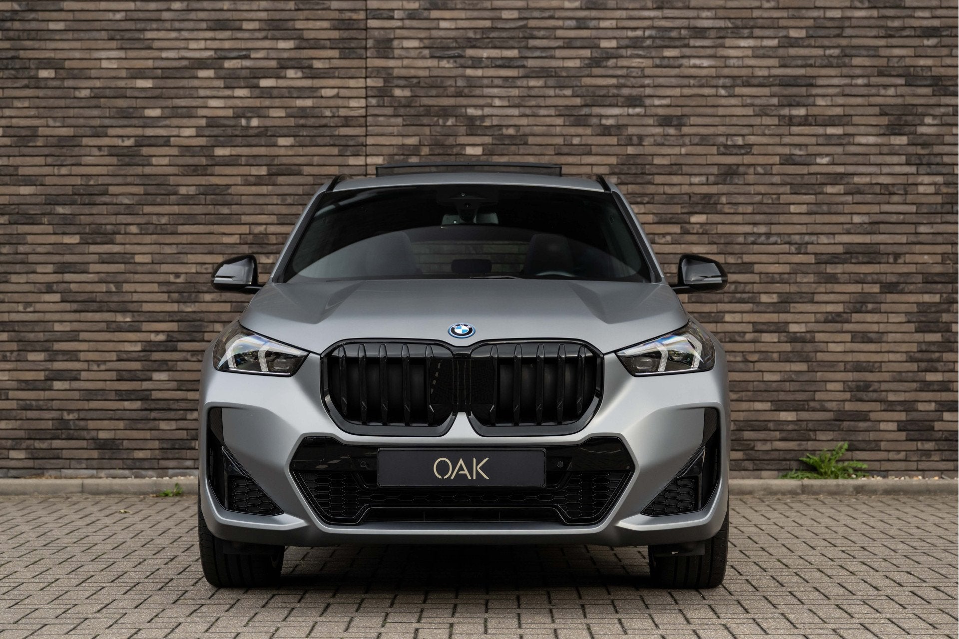 BMW X1 xDrive30e | M-Sport | Live Cockpit | Panorama | Leder, Auto's, Gebruikt, Zwart, Bedrijf, Hybride Elektrisch/Benzine