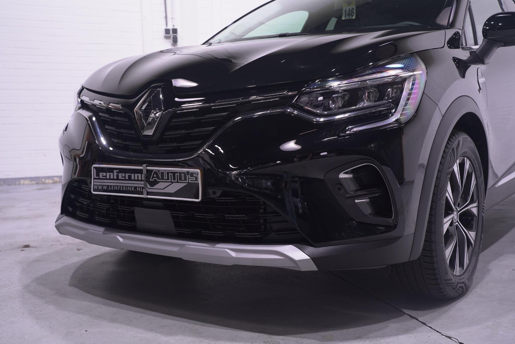 Renault Captur 1.6 E-Tech full hybrid 145 techno NAP 1e Eige, Auto's, Gebruikt, 715 kg, Leder en Stof, Zwart