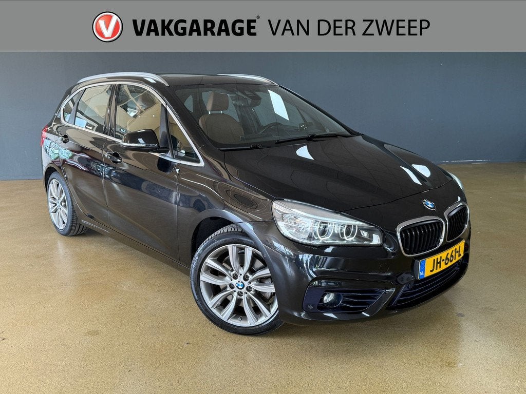 BMW 2 Serie Active Tourer 225xe Sport | HUD | Navigatie | E-, Auto's, BMW, Automaat, Gebruikt, Euro 6, Zwart