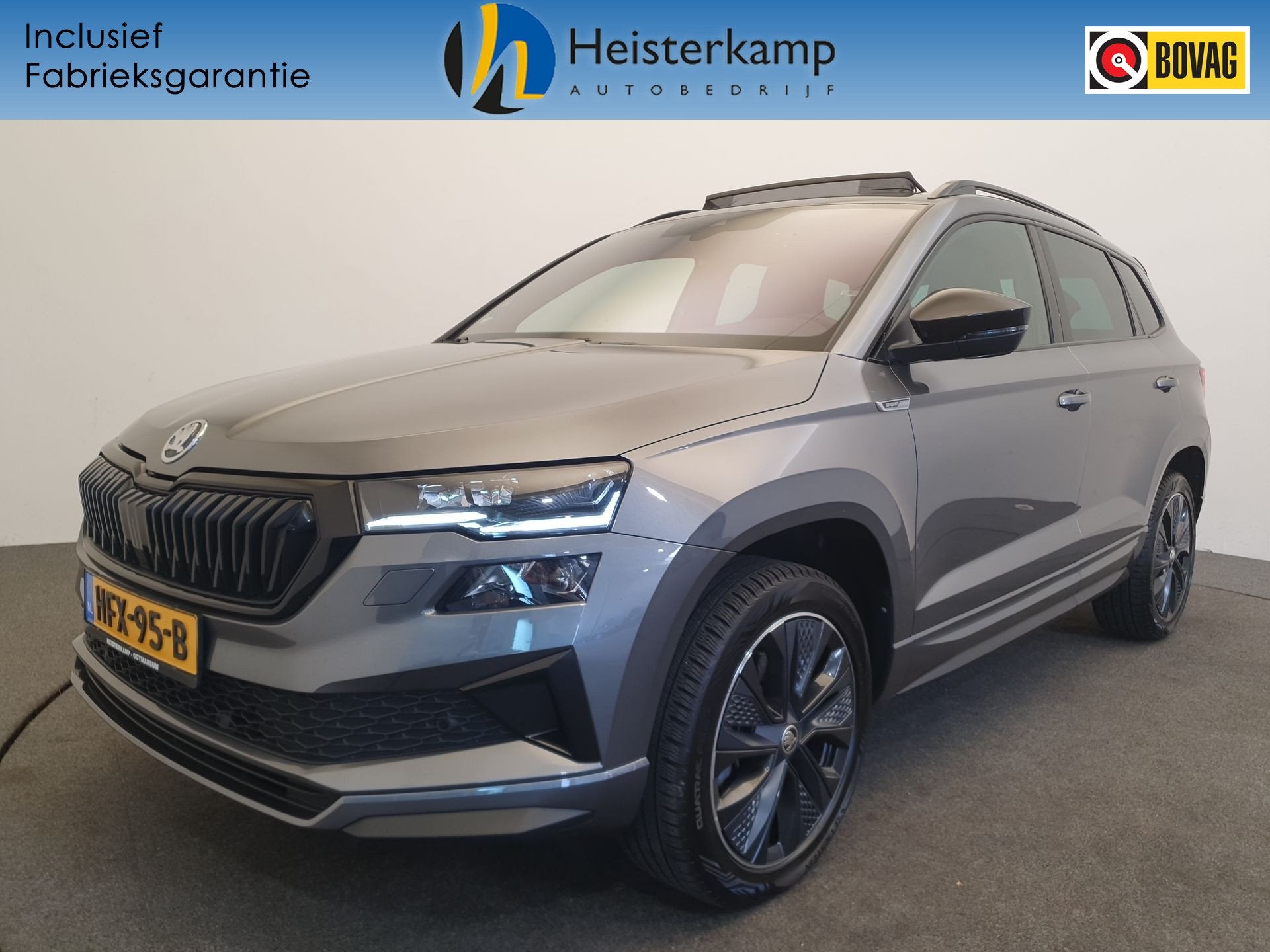 Skoda Karoq 1.5 TSI ACT 150pk DSG/AUT Sportline Business Pan, Auto's, Stof, 4 cilinders, Karoq, Bedrijf