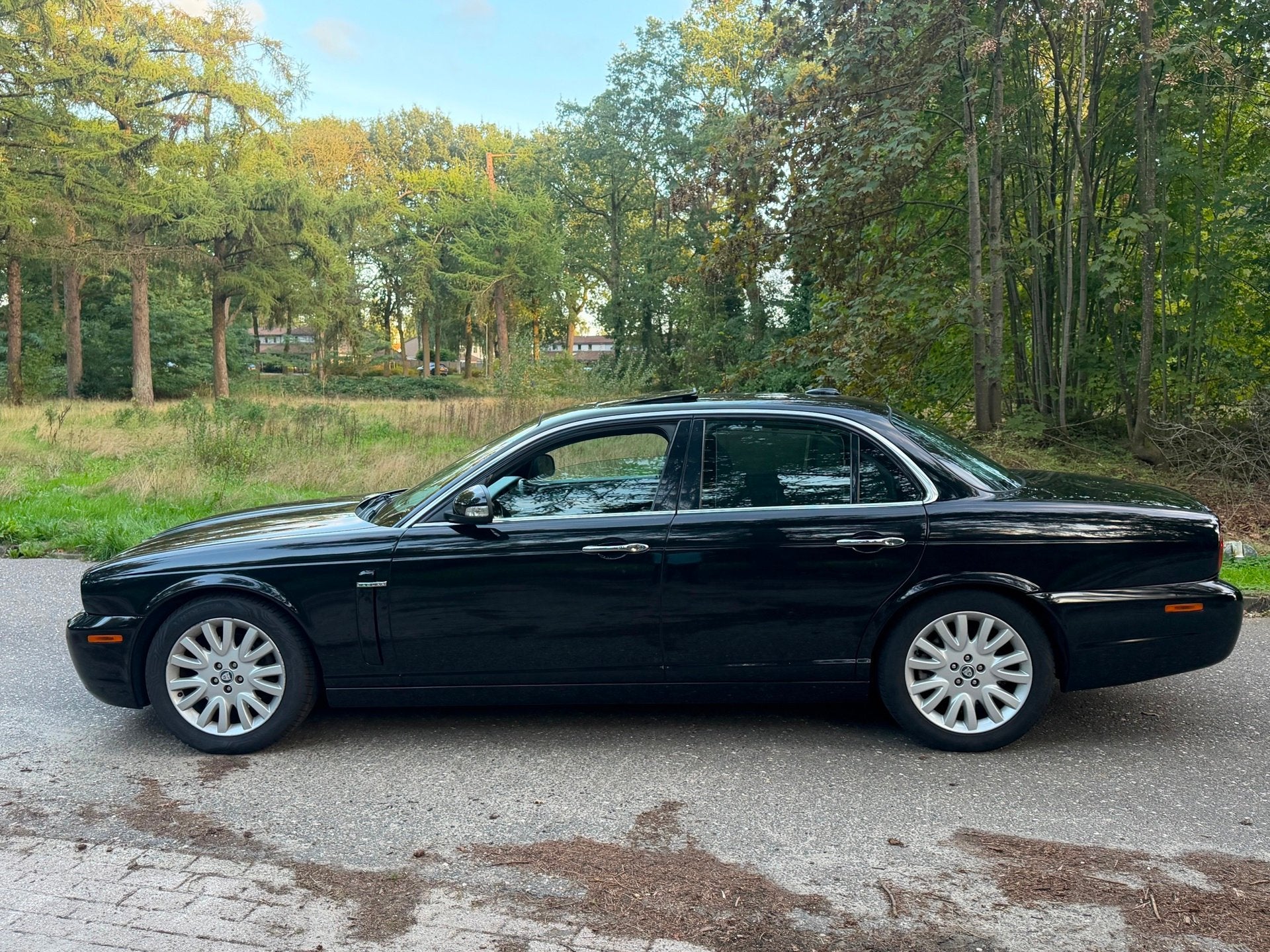 Jaguar XJ 2.7D V6 Portfolio Zwart 2009 Volle auto, Auto's, Dealer onderhouden, Achterwielaandrijving, Gebruikt, Zwart