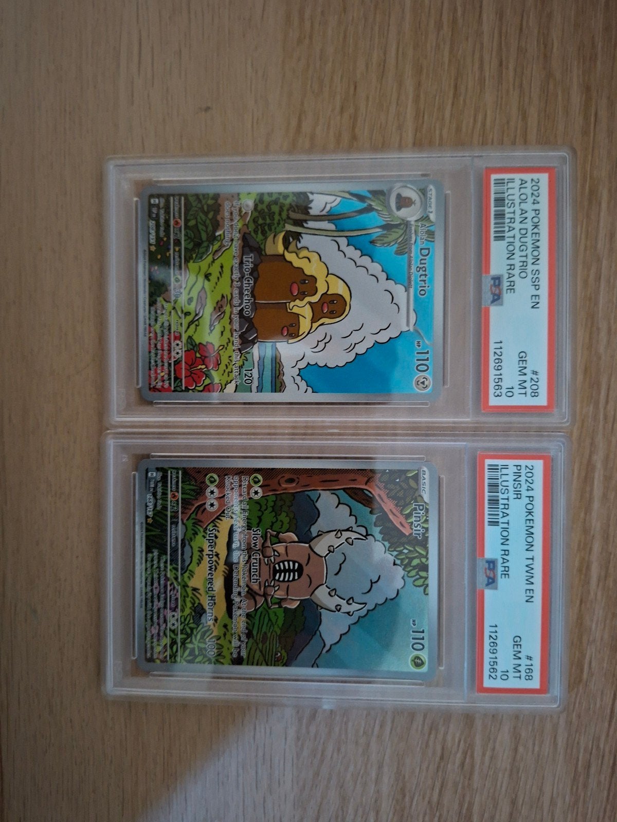 PSA 10 Graded Pokémon Kaarten: Alolan Dugtrio & Pinsir, Ophalen of Verzenden, Zo goed als nieuw, Meerdere kaarten
