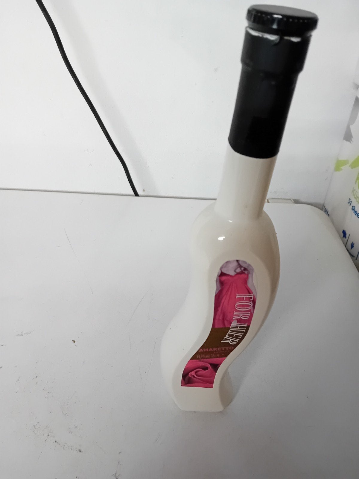 Glazen witte kromme fles., Huis en Inrichting, Ophalen of Verzenden