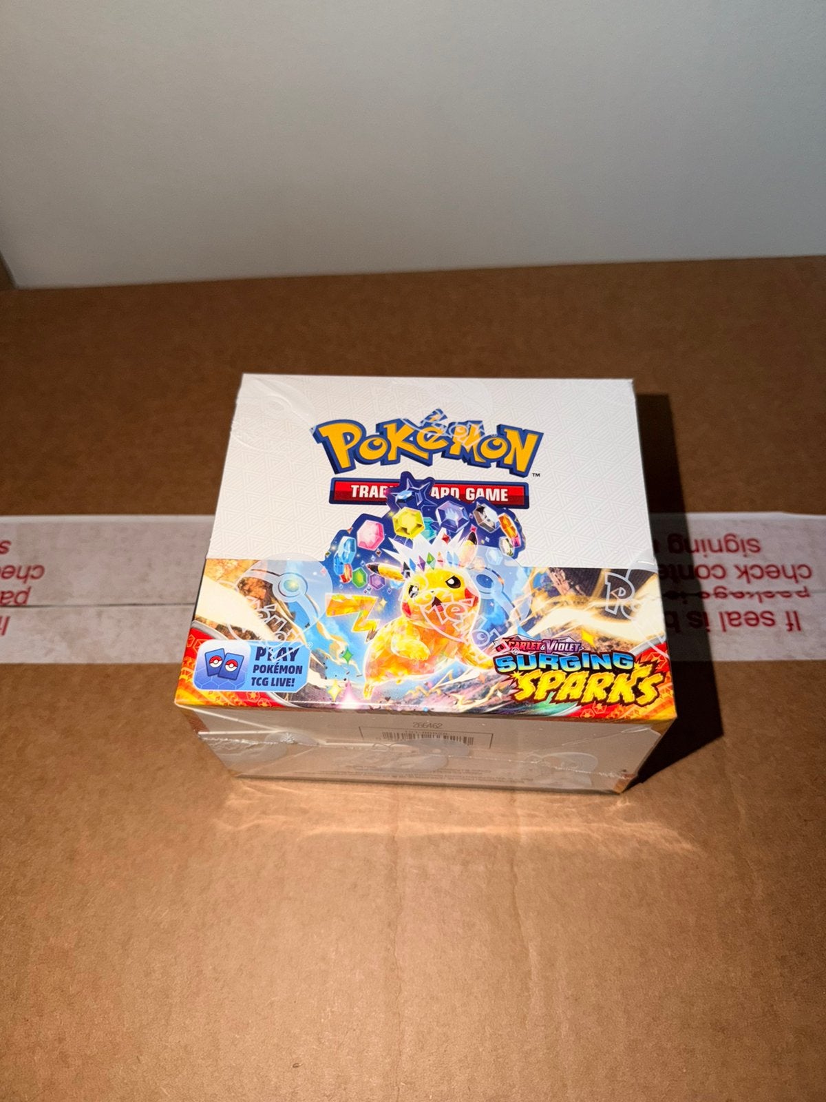 Surging sparks booster box, Ophalen of Verzenden, Zo goed als nieuw, Boosterbox