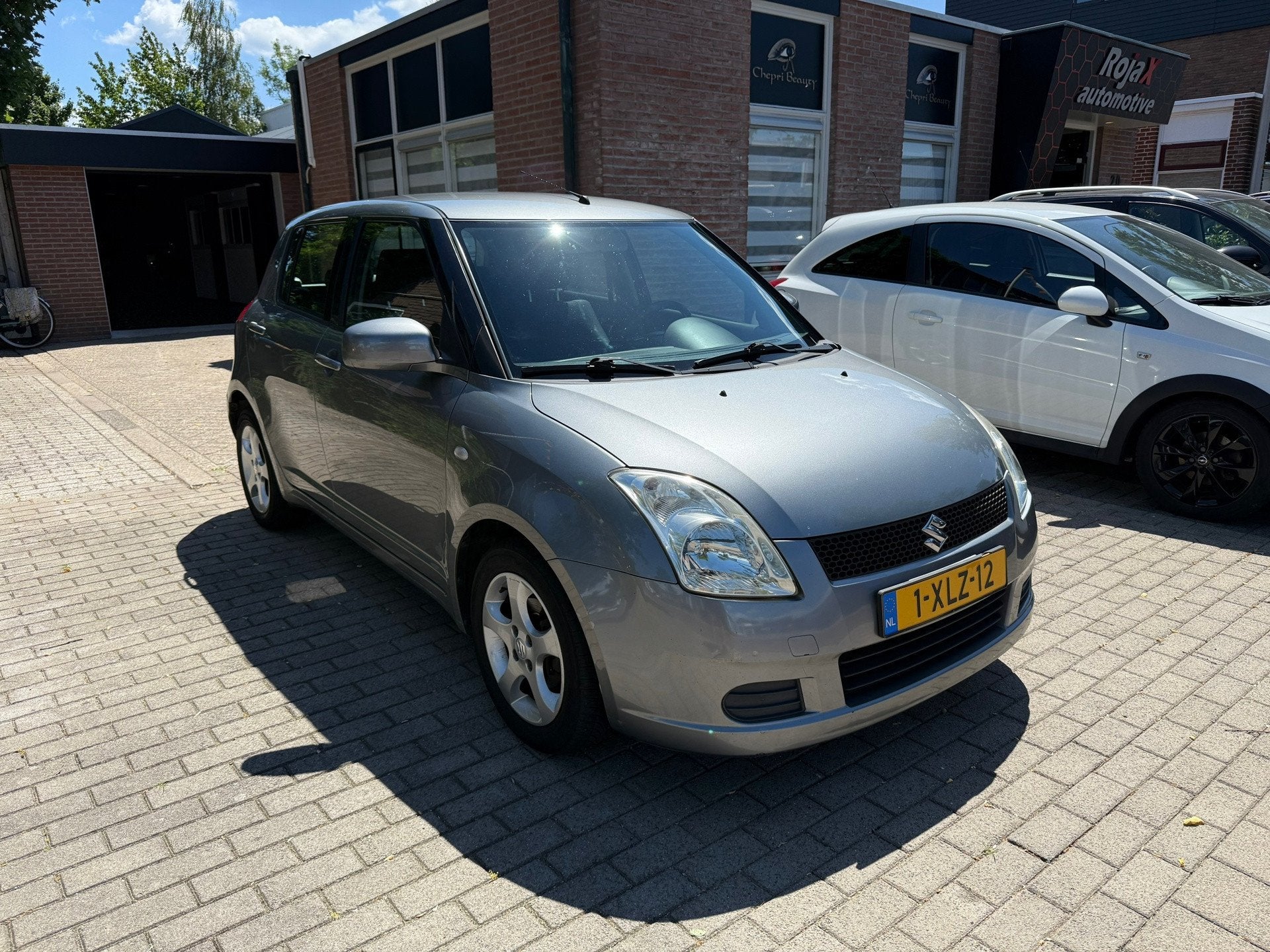 Suzuki Swift 1.3 GLS AIRCO - MEENEEMPRIJSJE., Auto's, Suzuki, Voorwielaandrijving, Stof, 965 kg, 400 kg