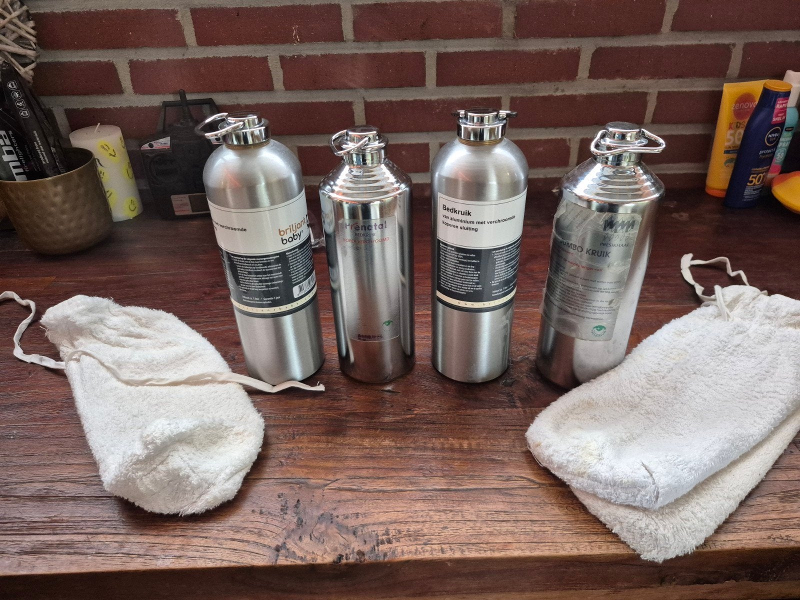 Set van 4 duurzame metalen flessen met hoezen, Ophalen of Verzenden, Gebruikt