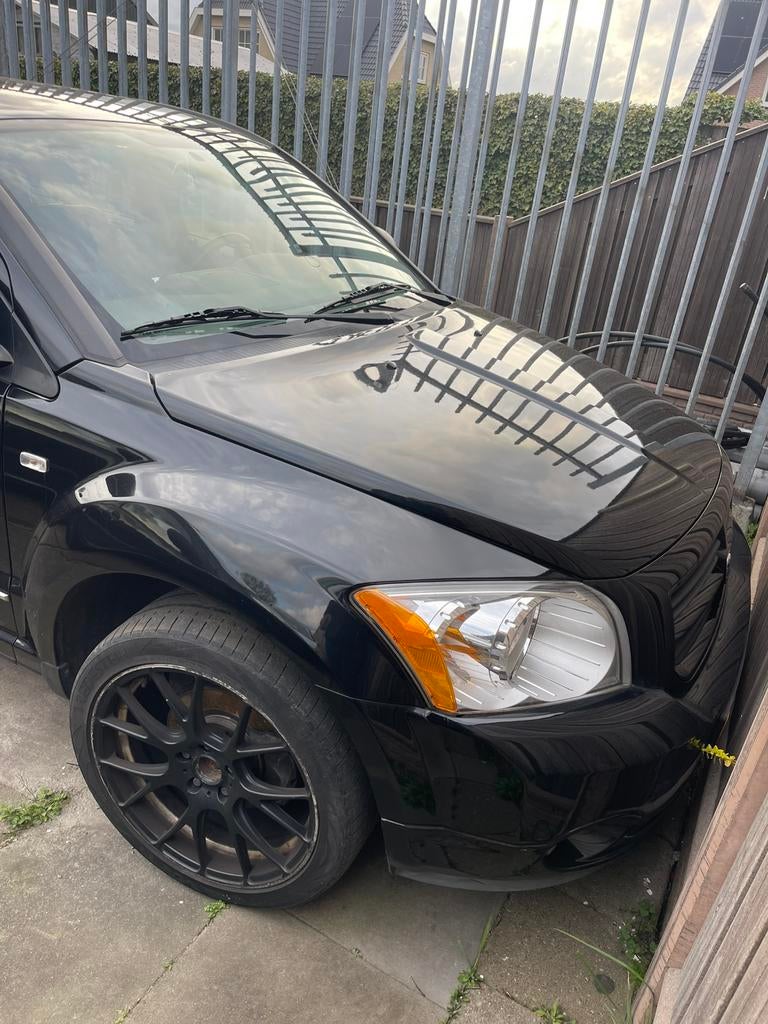 Dodge Caliber 2.0 CVT 2010 Zwart Bose sound system, 1998 cc, Zwart, Zwart, 1200 kg