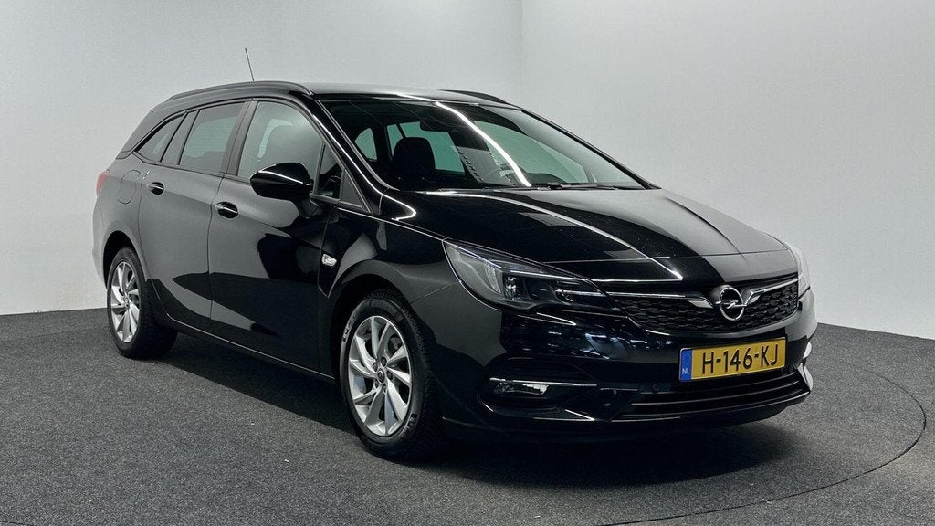 Opel Astra Sports Tourer 1.2 Business Edition ECC CAMERA LM, Auto's, Opel, Voorwielaandrijving, Stof, 1199 cc, Met garantie (alle)