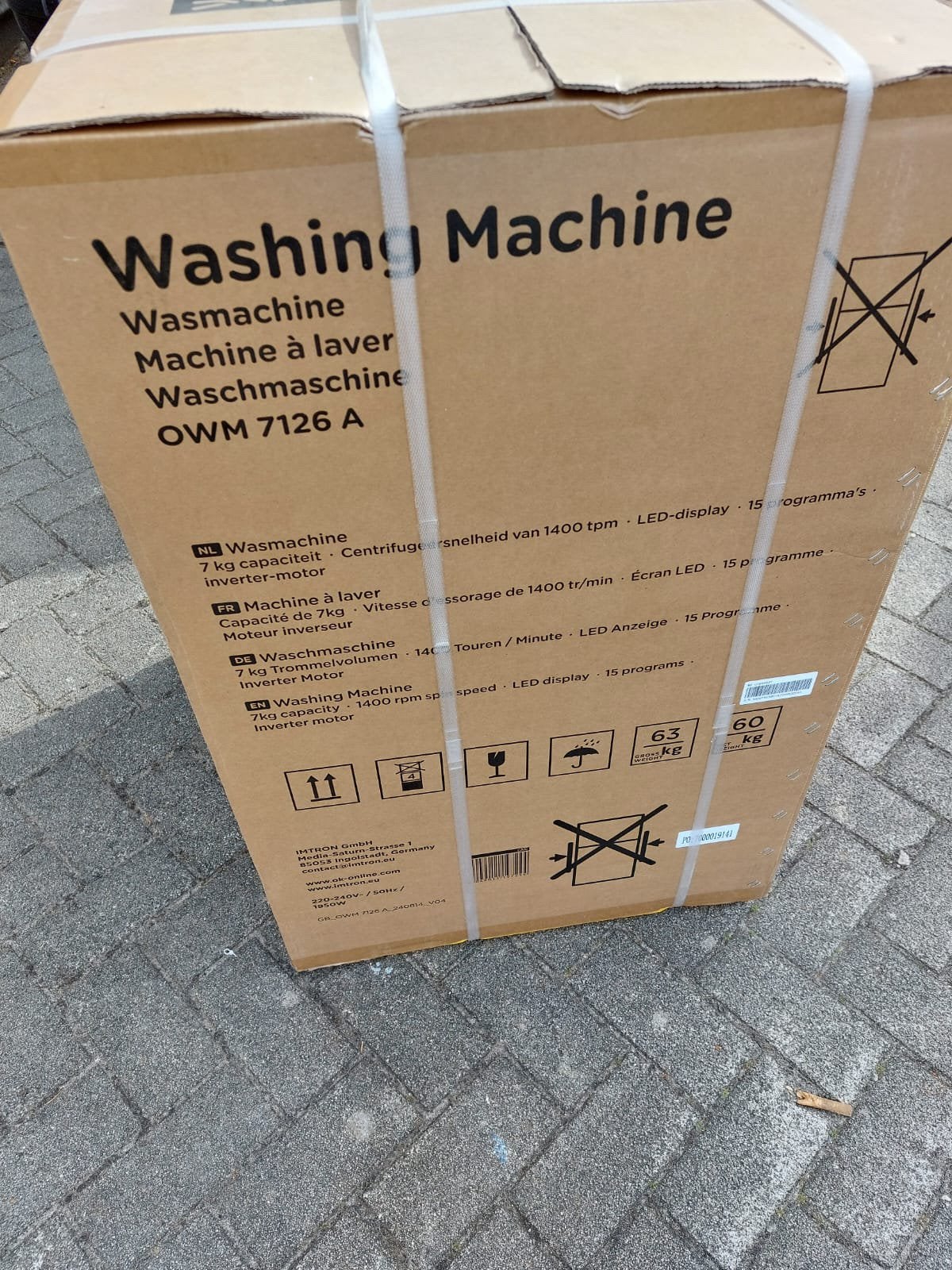 Nieuwe wasmachine nog in doos, Ophalen