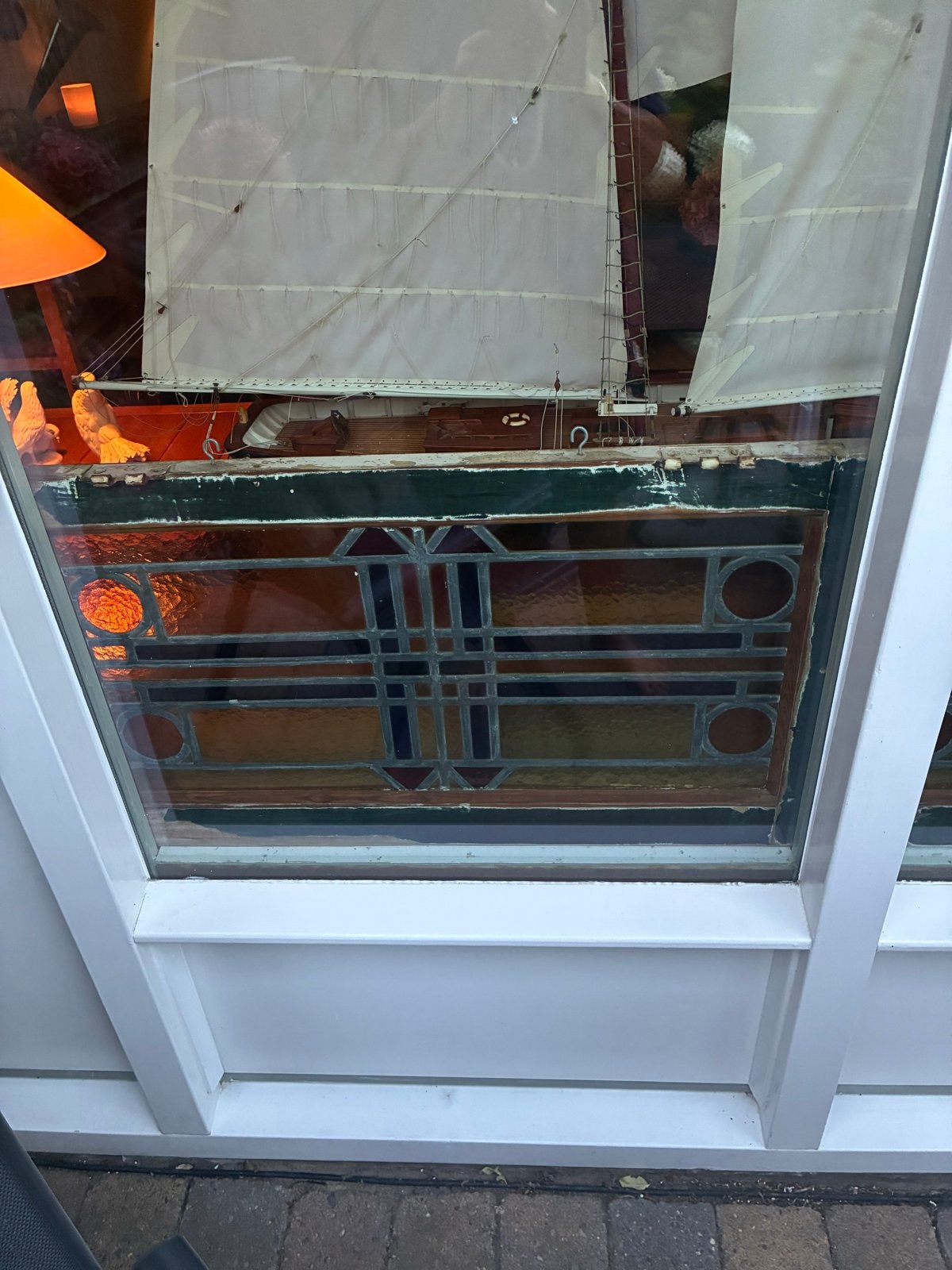 Twee stuks glas in lood ramen, Ophalen