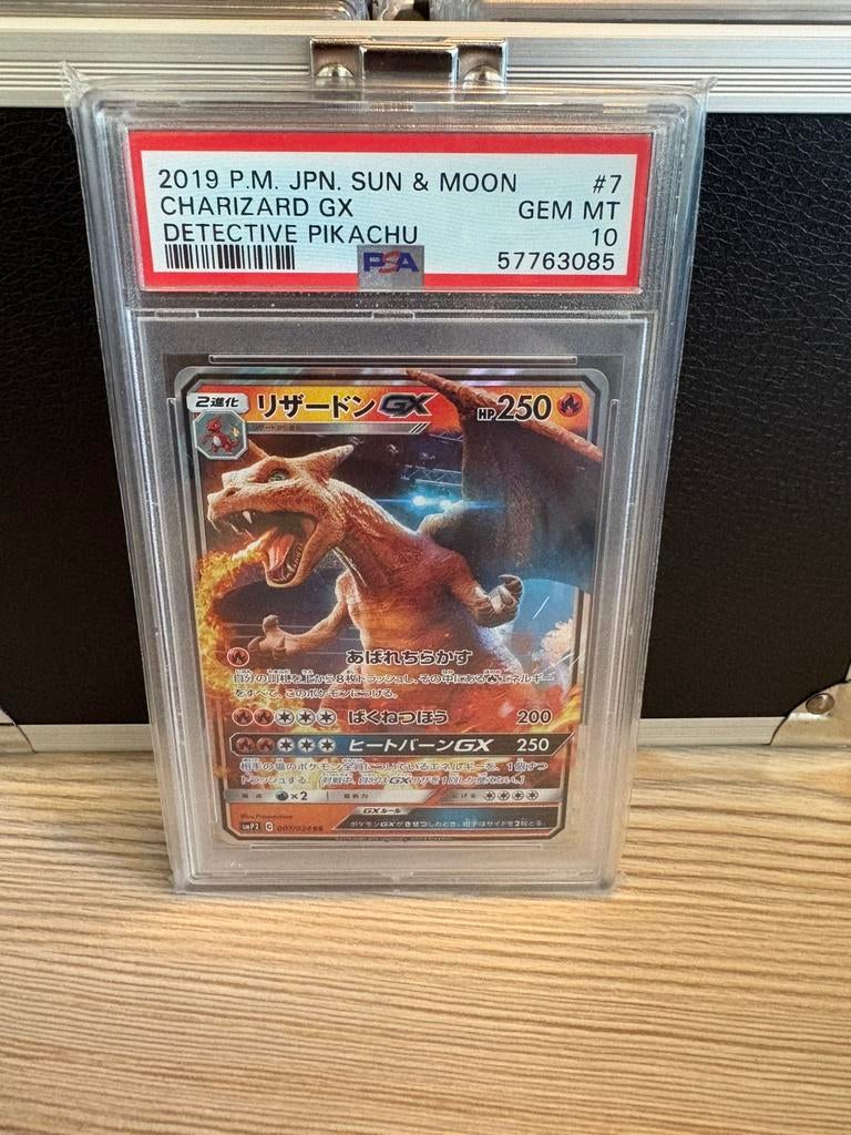 Charizard gx psa 10, Ophalen of Verzenden, Zo goed als nieuw, Meerdere kaarten, Foil