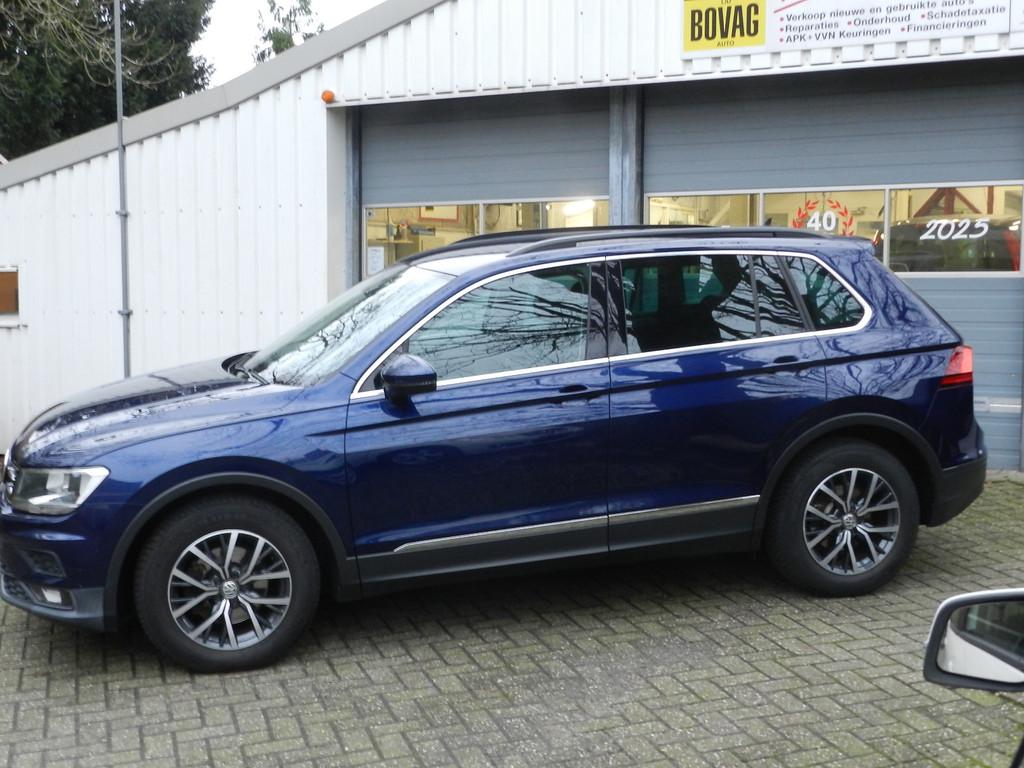 Volkswagen Tiguan 1.4 TSI 92KW 125PK Comfortline Executive C, Auto's, Voorwielaandrijving, Stof, Gebruikt, 4 cilinders