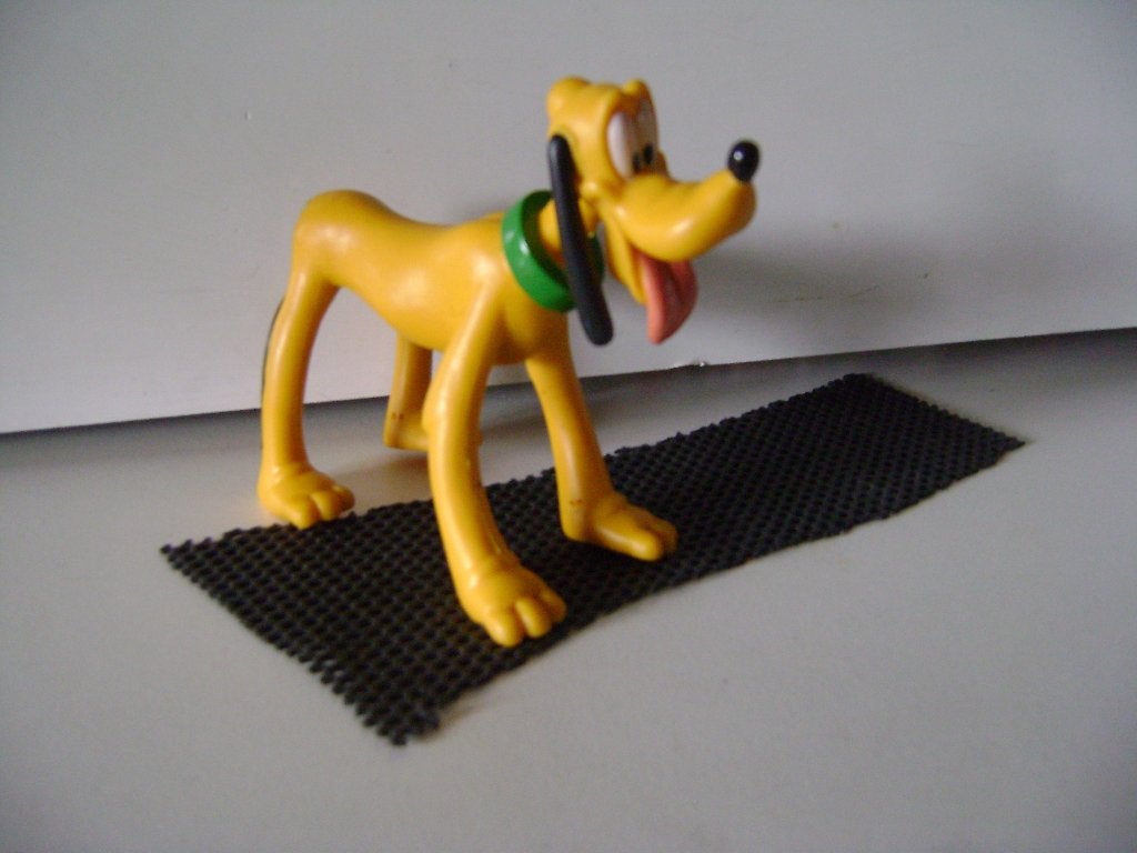 Pluto van kunststof 10cm, Verzamelen, Disney, Ophalen of Verzenden, Goofy of Pluto, Zo goed als nieuw, Beeldje of Figuurtje