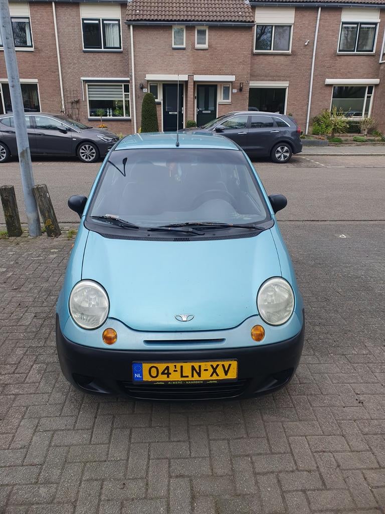 Daewoo Matiz uit 2003 Blauw, met apk tm april 2027, Auto's, Voorwielaandrijving, Stof, Matiz, Blauw
