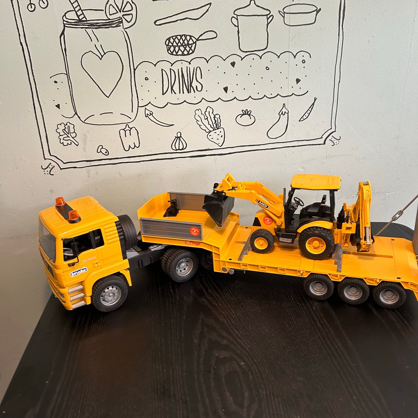 Bruder MAN Vrachtwagen met Dieplader en Graafmachine, Ophalen of Verzenden, Zo goed als nieuw