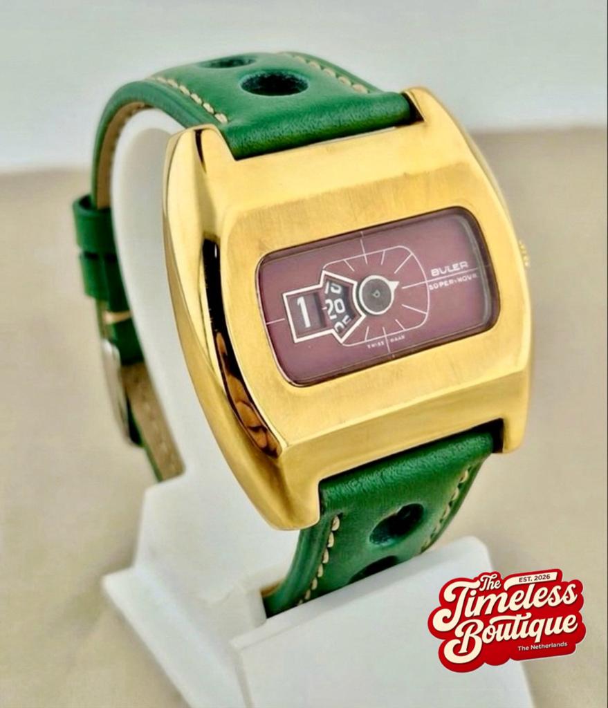 1970s Buler "Super-Nova" Jump Hour manu Zwitsers horloge, Ophalen of Verzenden, Goud