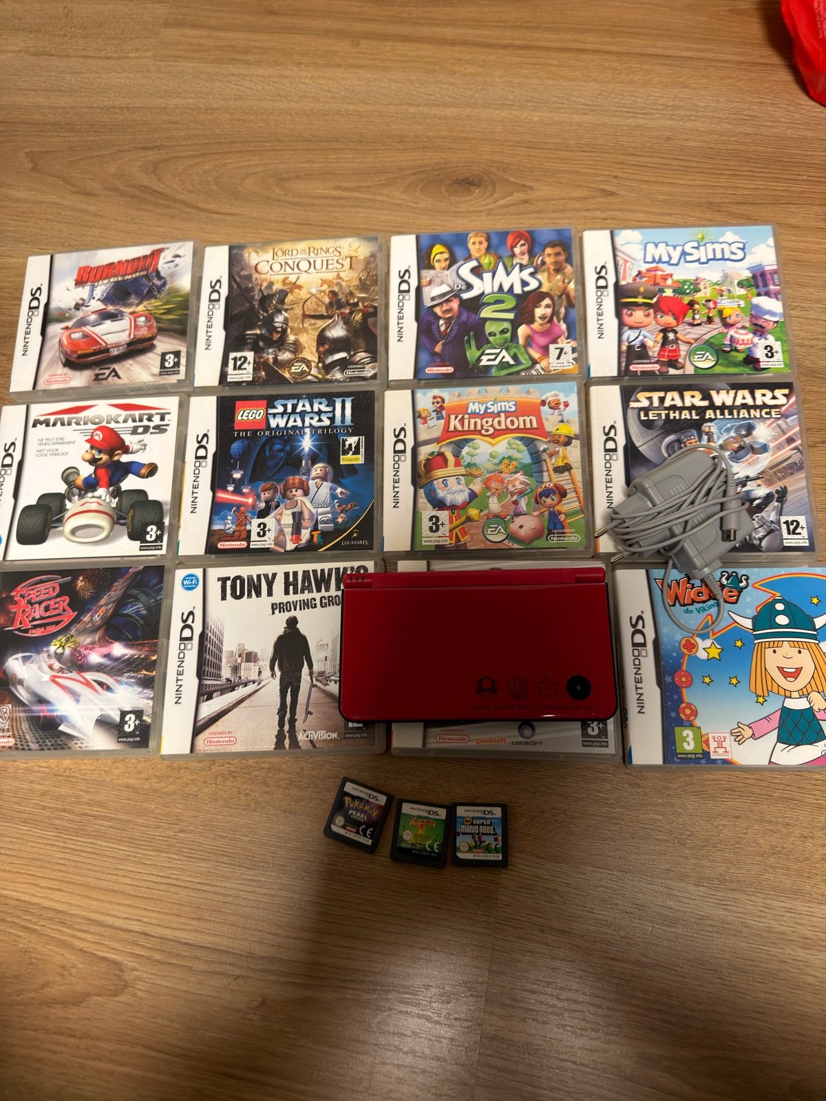 Nintendo DSi XL Rood met 16 Spellen (o.a. Pokémon, Mario), Spelcomputers en Games, Dsi XL, Ophalen of Verzenden, Rood, Gebruikt