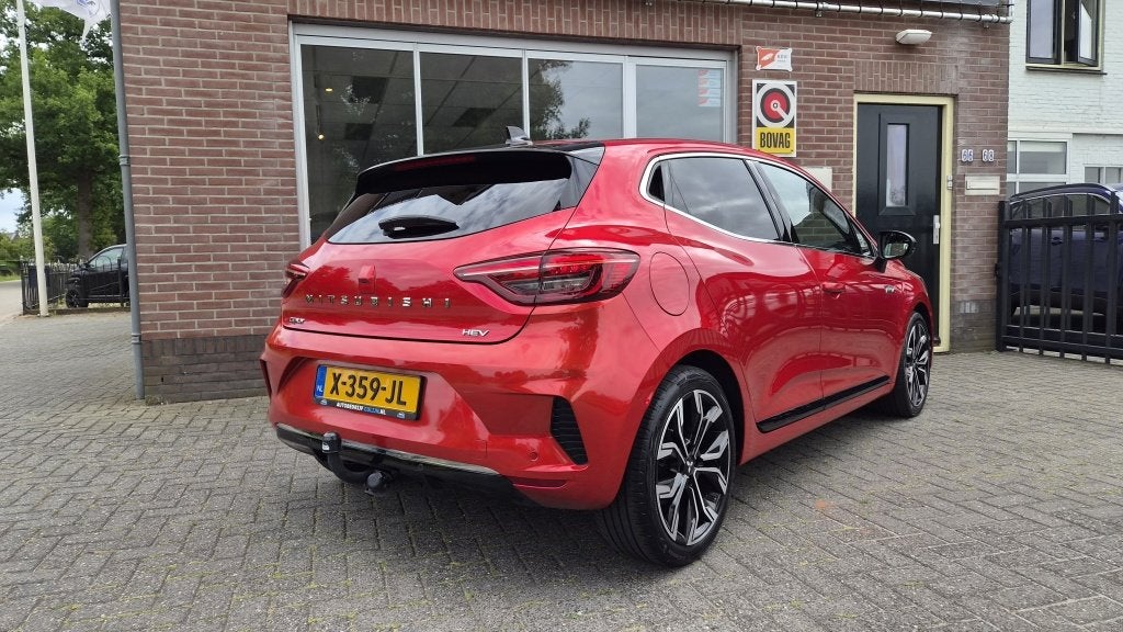 Mitsubishi Colt 1.6 HEV Instyle, Trekhaak BOSE NL Auto, Auto's, Dealer onderhouden, Gebruikt, 4 cilinders, Leder en Stof