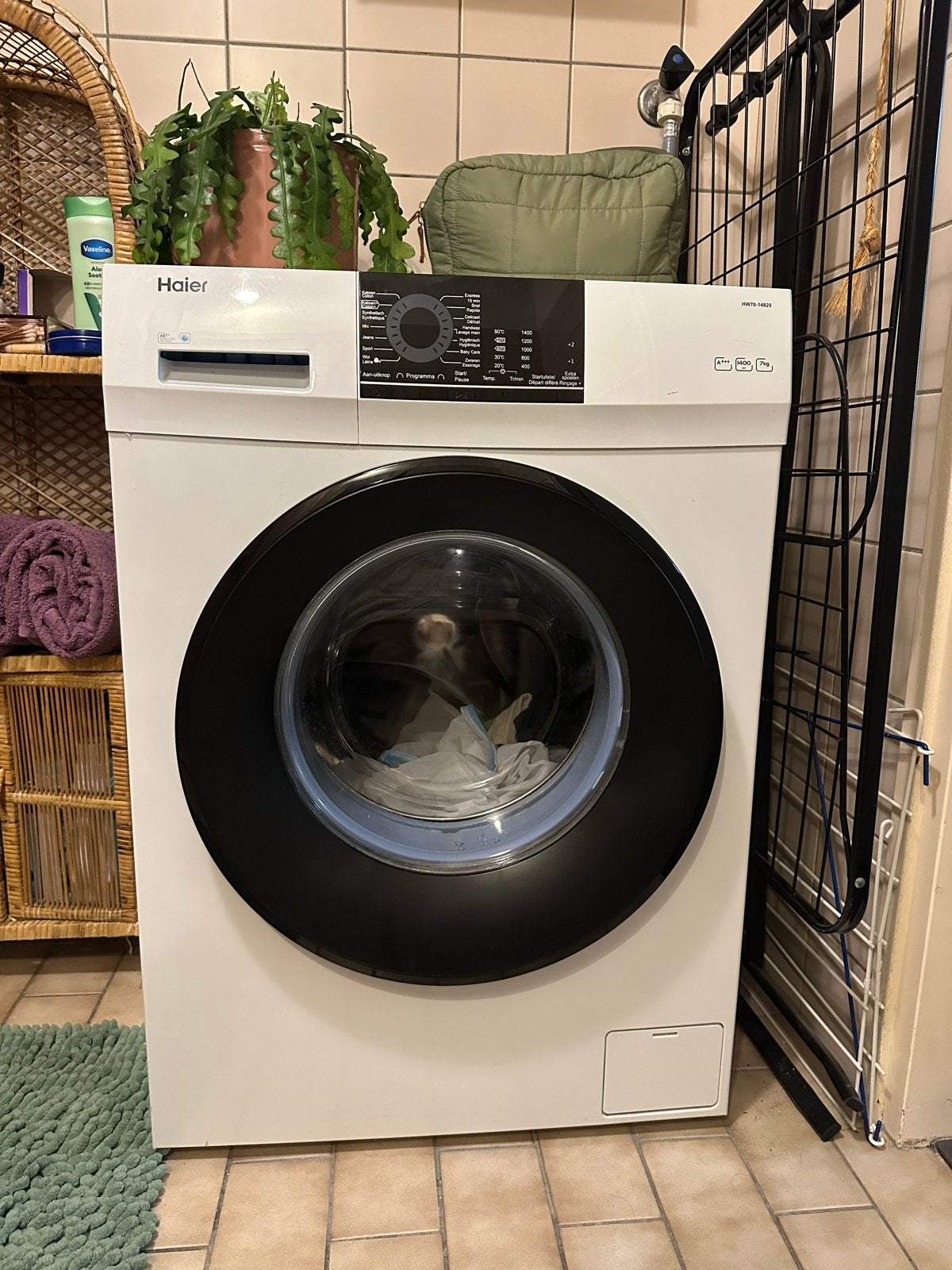 Haier HW70-14829 Wasmachine - 7kg, 1400 toeren, Ophalen, Gebruikt, Voorlader, 85 tot 90 cm