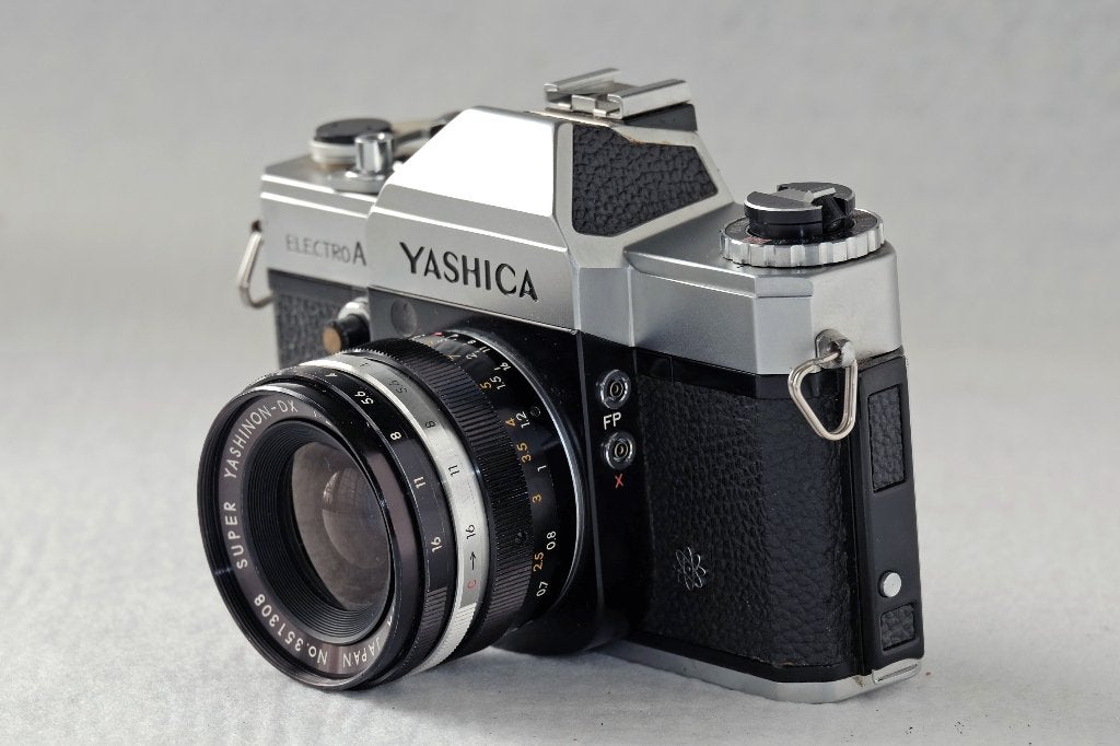 Yashica AX, Super Yashinon DX 35mm f/2.8 lens M42, Ophalen of Verzenden, Gebruikt, Spiegelreflex, Overige Merken