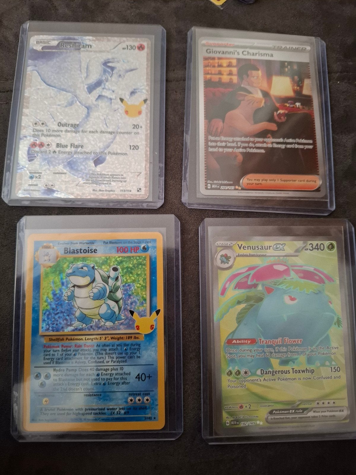 Pokémon kaarten: Blastoise, Reshiram, Venusaur, Giovanni, Ophalen of Verzenden, Zo goed als nieuw, Meerdere kaarten