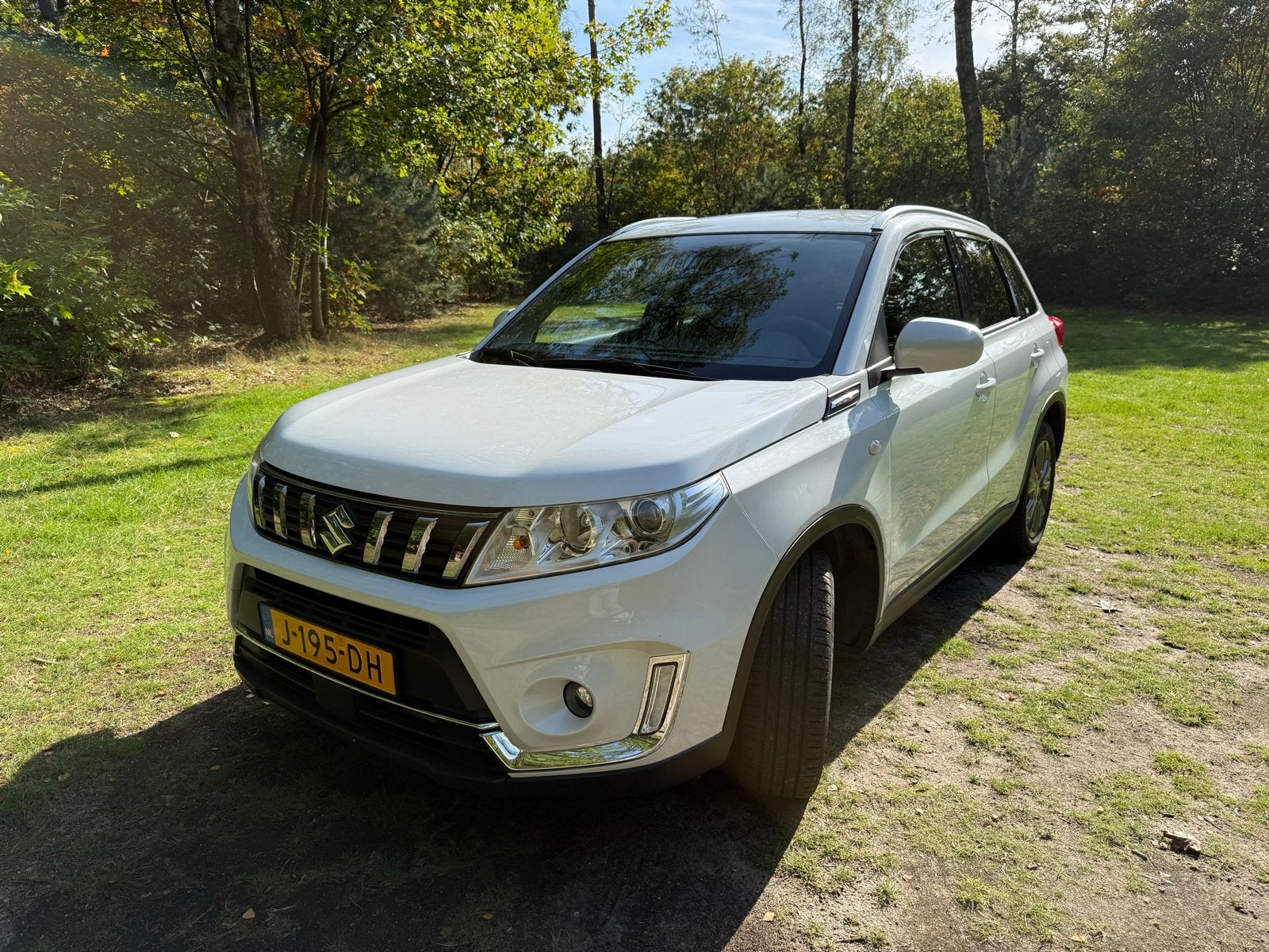 Suzuki Vitara 1.0 Boosterjet 112pk 2WD 2020 Wit, Auto's, Voorwielaandrijving, 400 kg, Origineel Nederlands, 1200 kg