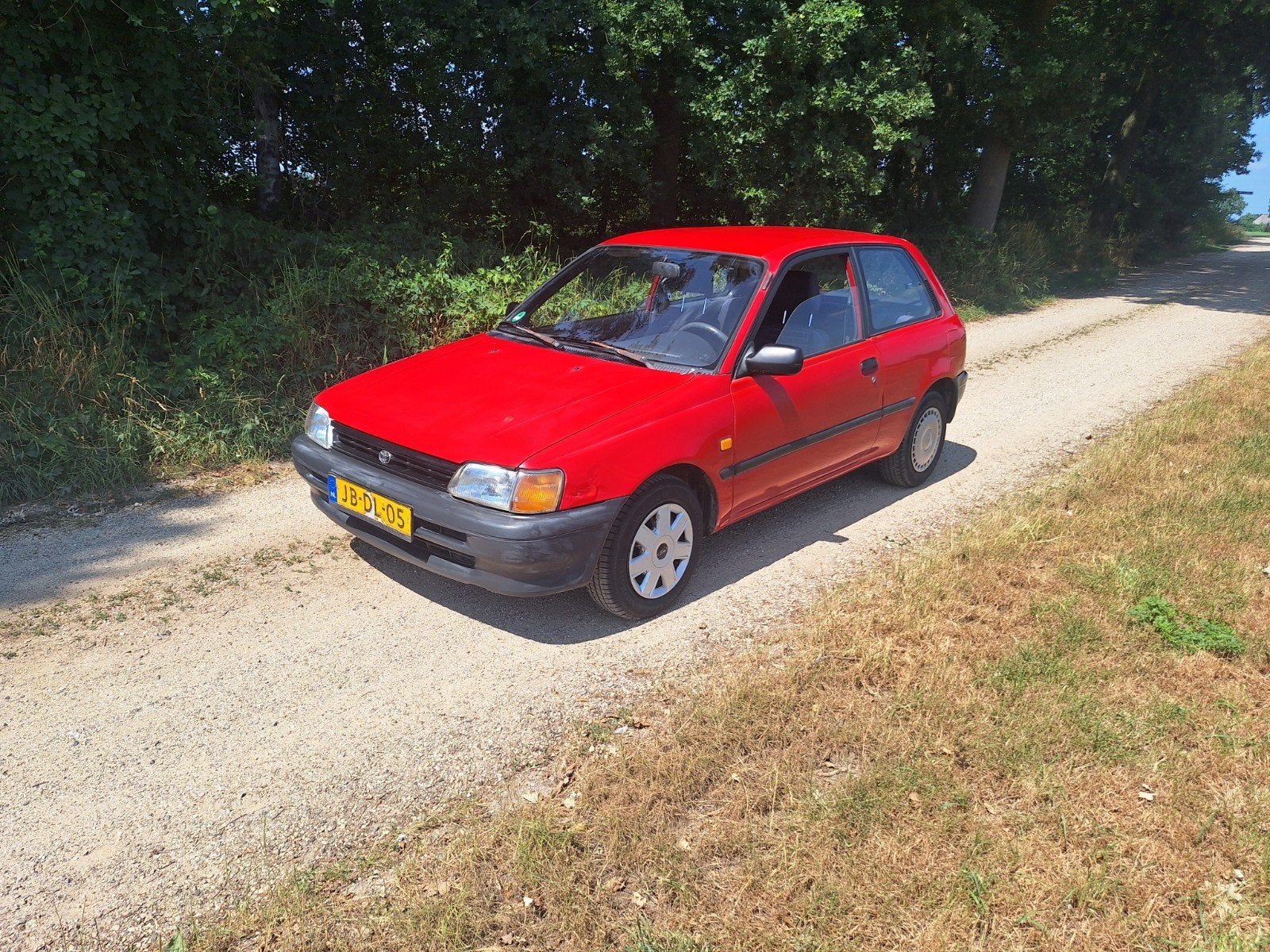 Toyota Starlet 1.3 XLI AUT E2 1994 Rood, 74 pk, 4 cilinders, Starlet, 400 kg