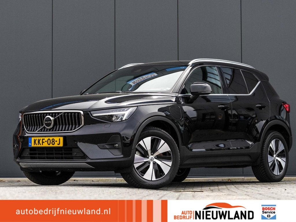 Volvo XC40 1.5 T4 Plug-in hybrid Plus Bright stoel en stuurv, Stof, Euro 6, 1712 kg, Zwart