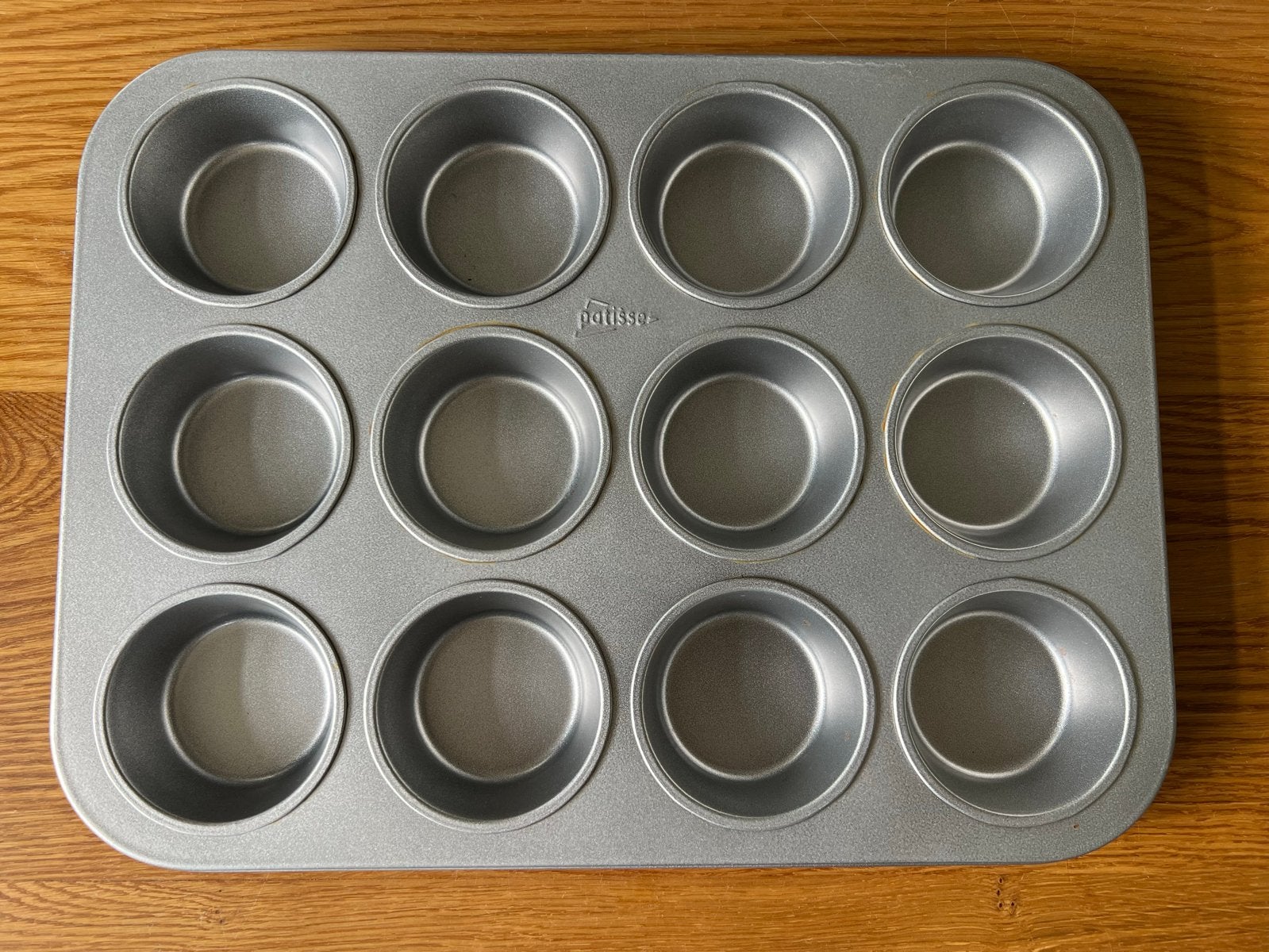 Patisse Muffin Bakvorm - 12 Cups, Ophalen of Verzenden, Metaal, Grijs, Overige merken