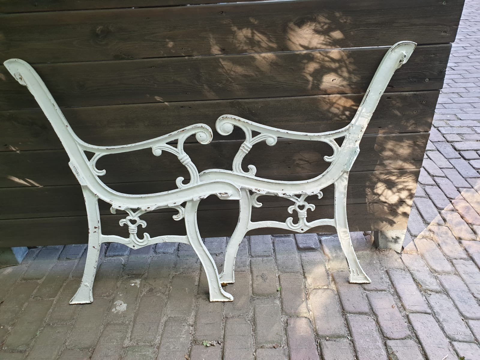 Te koop 2 gietijzeren banksteunen., Tuin en Terras, Tuinbanken, Ophalen, Gebruikt, Metaal