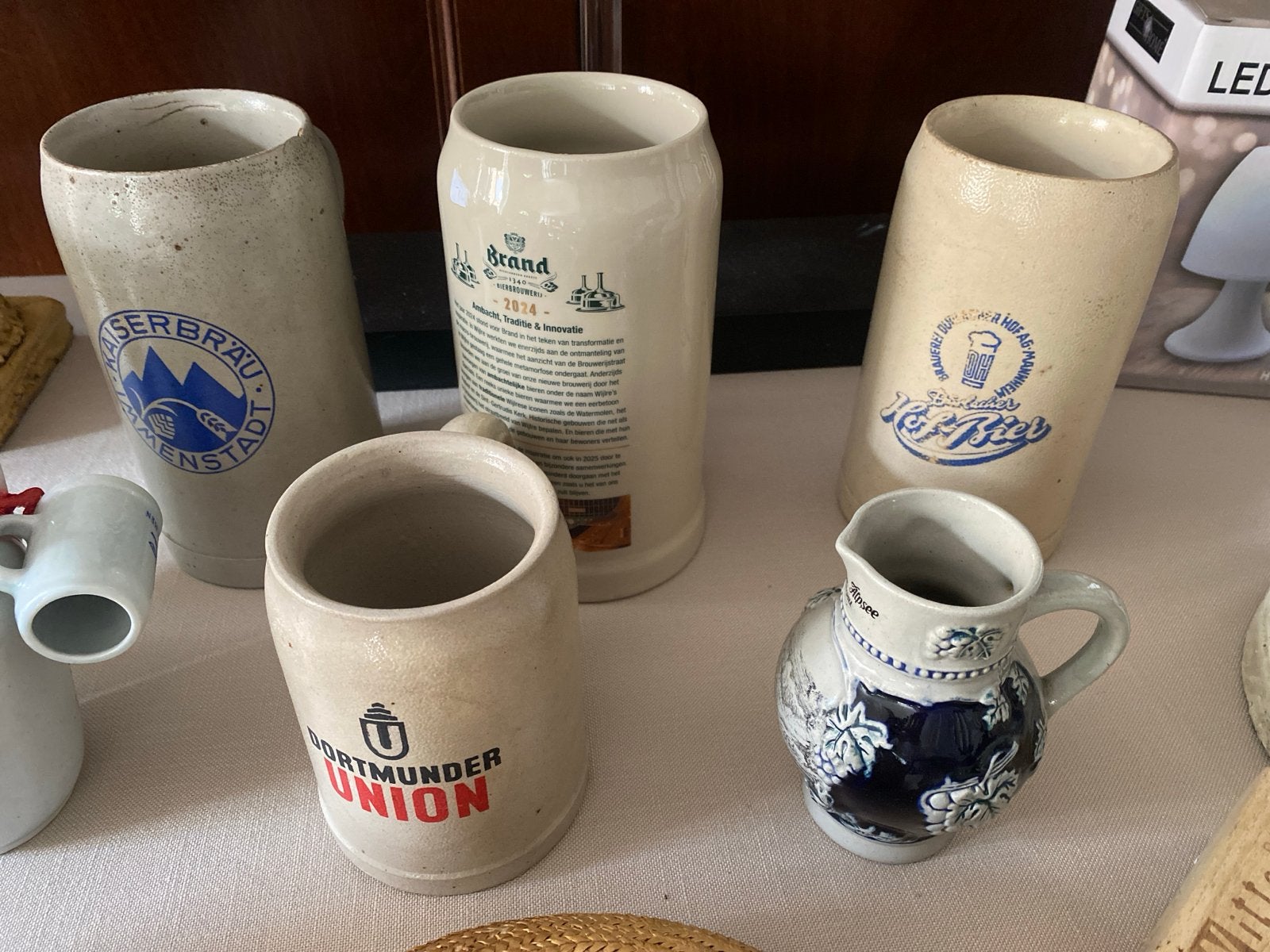 Diverse bierpullen en een kruikje, Verzamelen, Ophalen, Gebruikt, Pul(len), Brand
