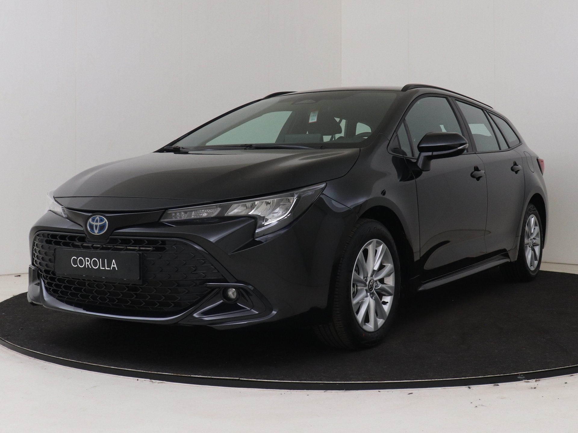 Toyota Corolla Touring Sports 1.8 Hybrid Active *NIEUW* | Ui, 4 cilinders, Met garantie (alle), Corolla, Zwart