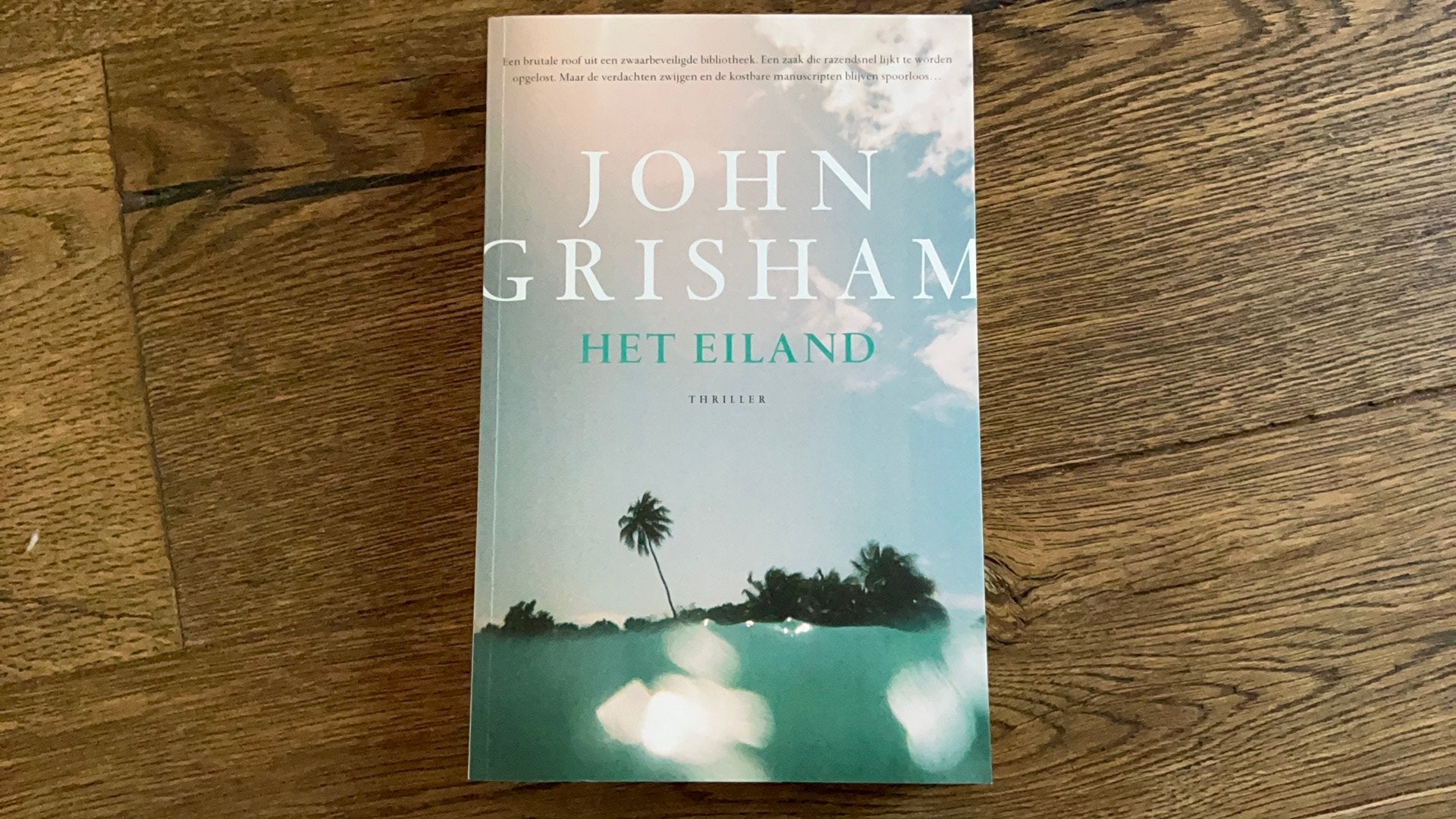 John Grisham - Het eiland, Boeken, Thrillers, Zo goed als nieuw, Ophalen of Verzenden
