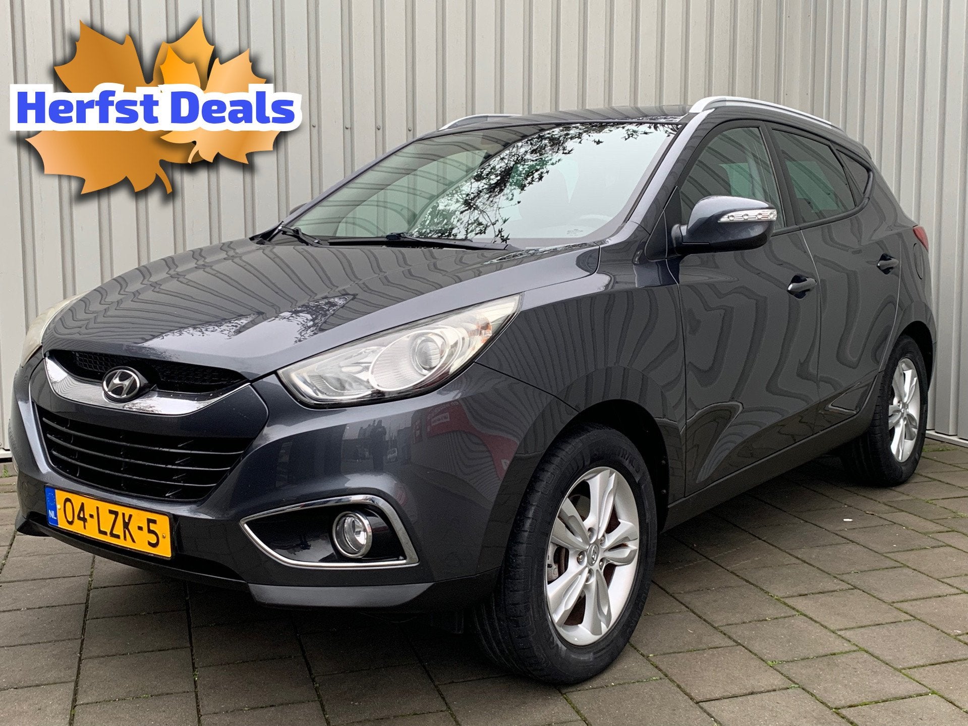 Hyundai Ix35 2.0i Business Edition|Navigatie|149000KM|Climat, Auto's, Zwart, 4 cilinders, Leder en Stof, 163 pk
