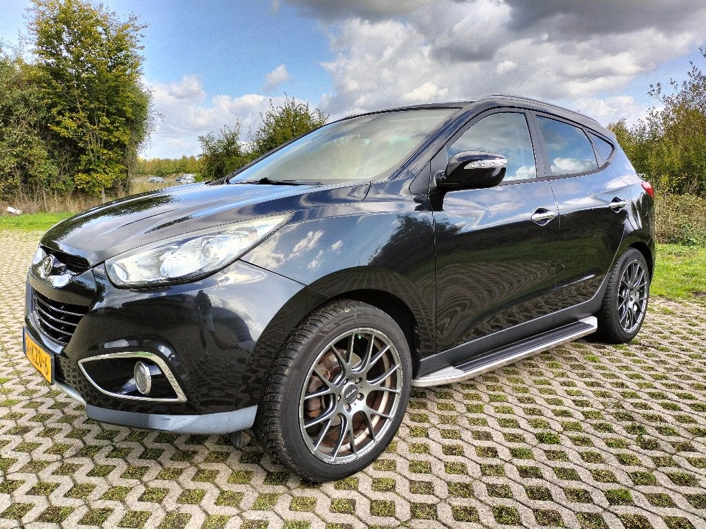 Hyundai ix35 2.0i CVVT 163 pk | Panorama dak | Zwart | 2010, Auto's, 1998 cc, 4 cilinders, 75 €/maand, Handgeschakeld