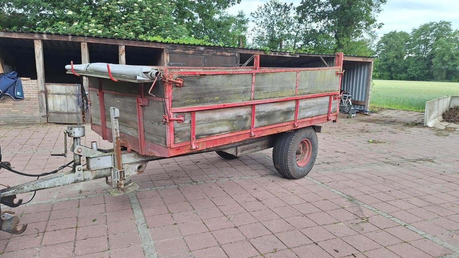 Kieper met recent nieuwe banden, Ophalen, Transport