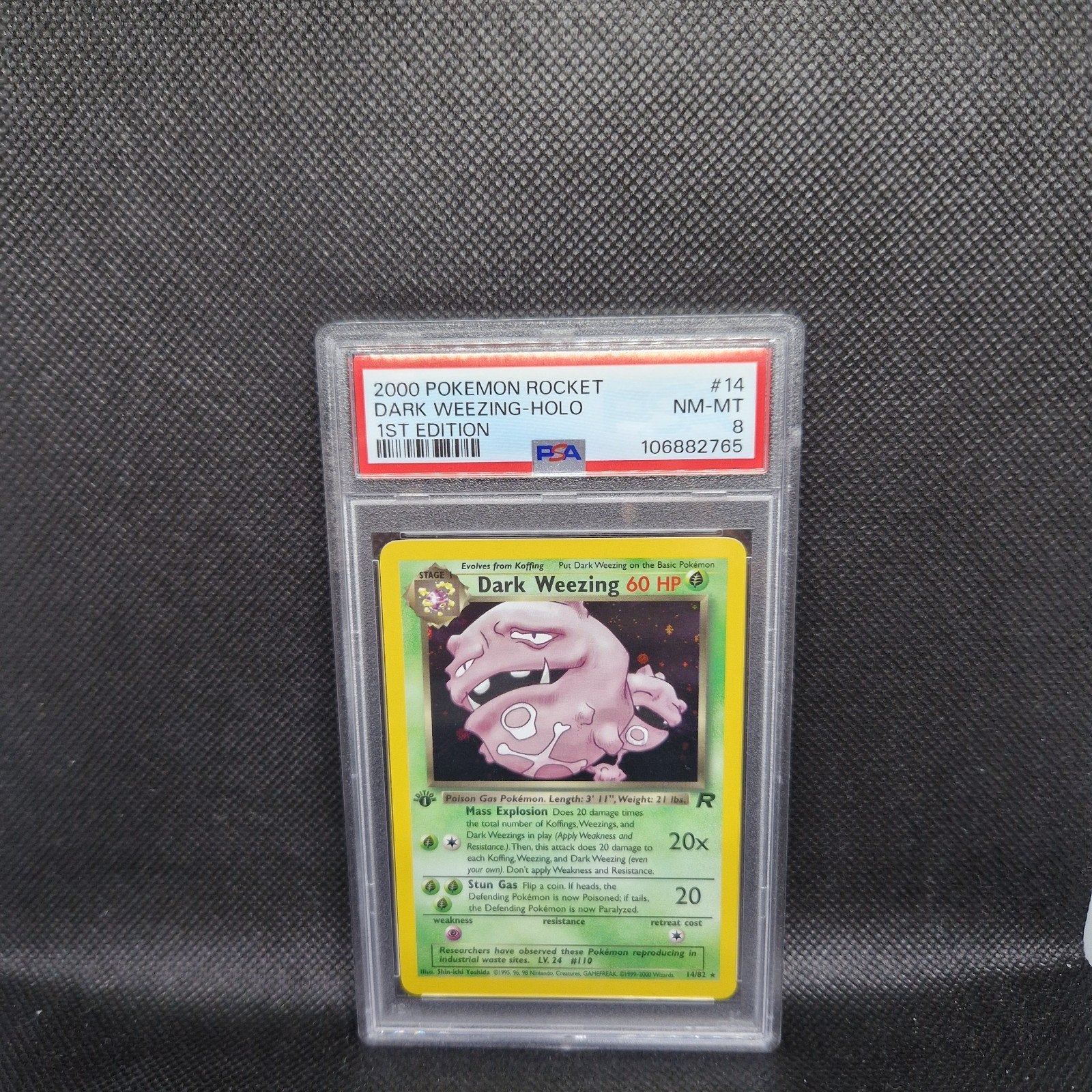 Dark Weezing Holo 1st Edition Rocket PSA 8, Ophalen of Verzenden, Zo goed als nieuw