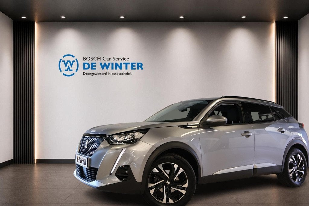 Peugeot 2008 1.2 PureTech Allure Pack, Gebruikt, Euro 6, 1199 cc, Leder en Stof