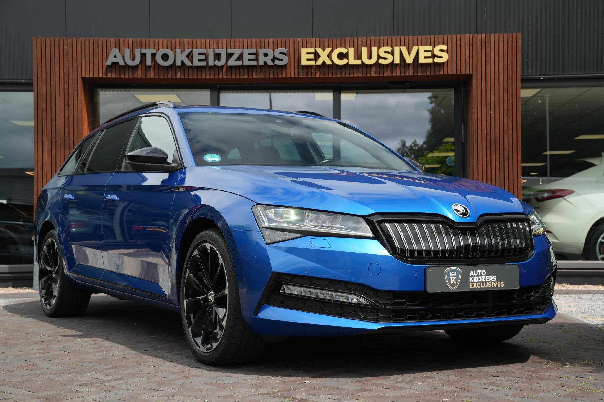 Skoda Superb Combi 1.4 iV Sportline Panoramadak Canton 360 C, Gebruikt, Euro 6, Automatische klimaatregeling, Blauw
