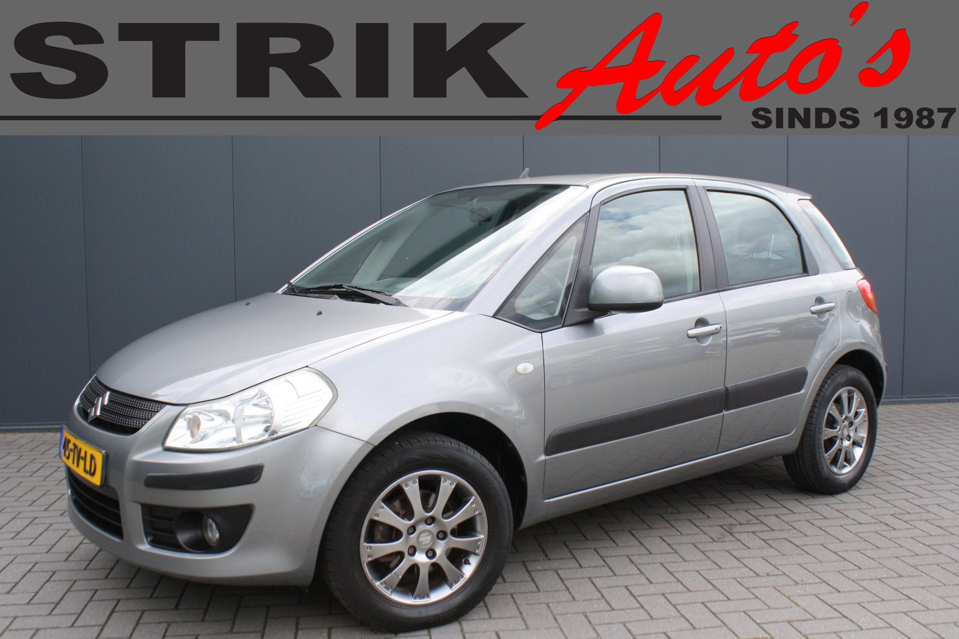 Suzuki SX4 1.6 Exclusive AUTOMAAT - CRUISE CONTROL - AIRCO -, Auto's, Suzuki, Stof, Gebruikt, Zwart, 4 cilinders