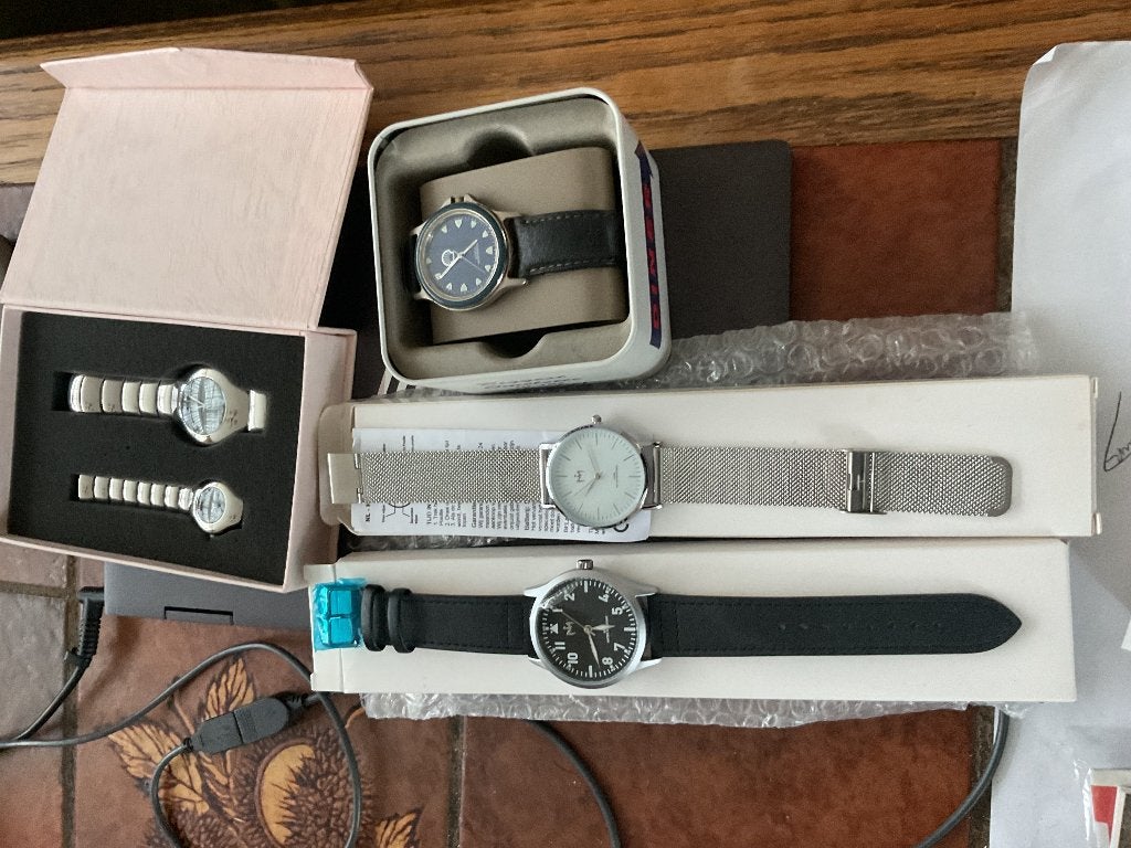 Horloges en een klok, Sieraden, Tassen en Uiterlijk, Overige materialen, Polshorloge, Overige materialen, Zo goed als nieuw