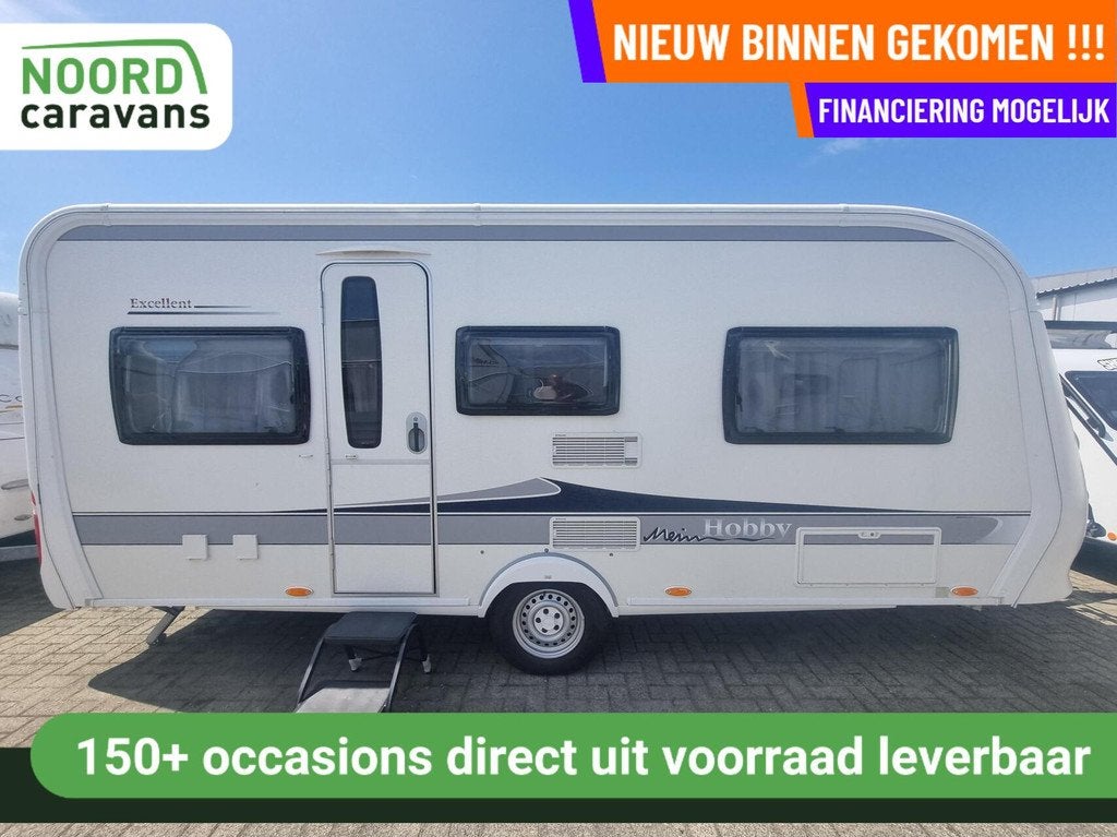 Hobby 495 UL excellent ENKELE BEDDEN + VOORTENT + FIETSENDR, Caravans en Kamperen, Caravans, Hordeur, Rondzit, Hobby, 7 tot 8 meter